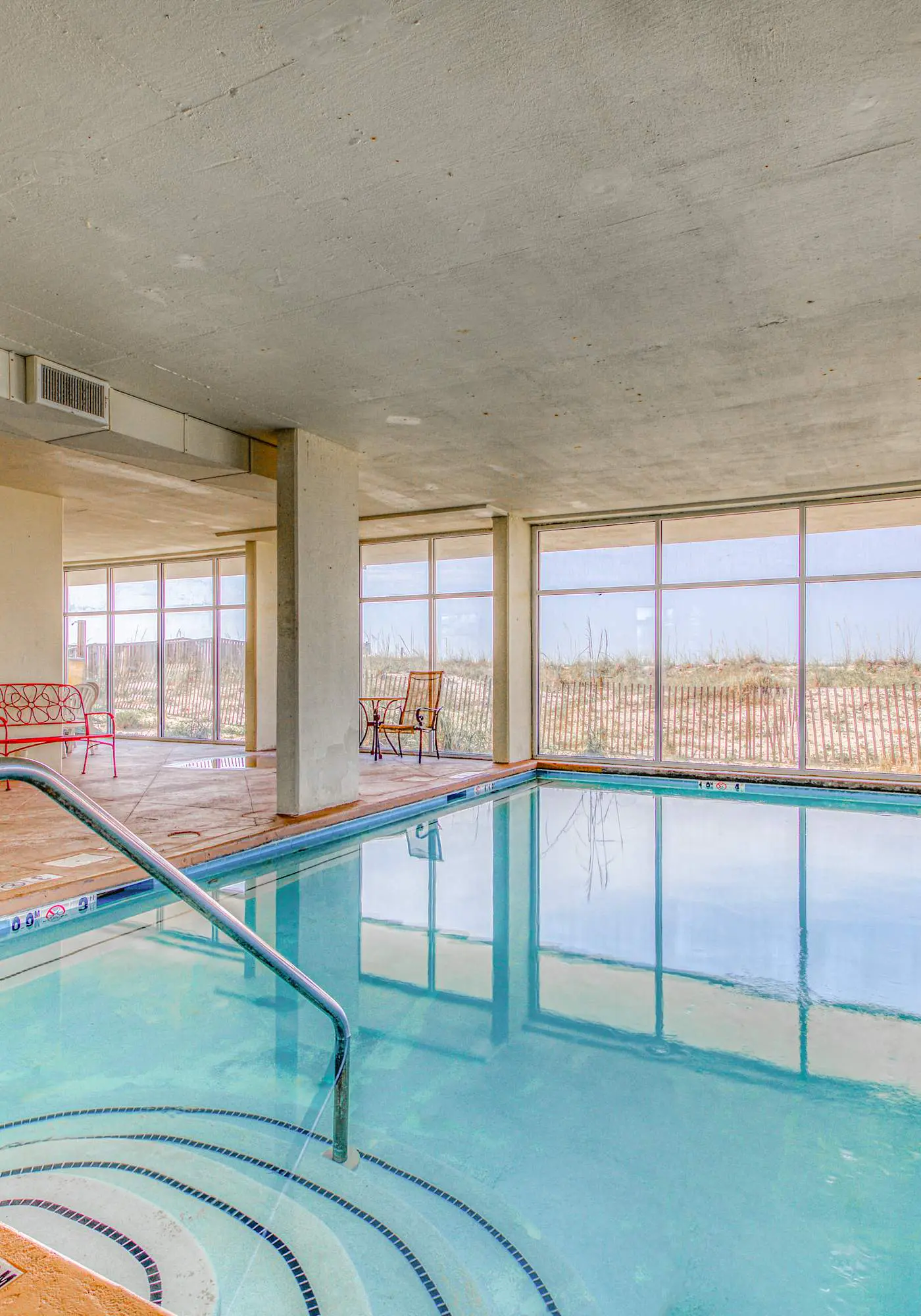 Fourth-floor beach condo w amazing views, indoor pool, & beach access