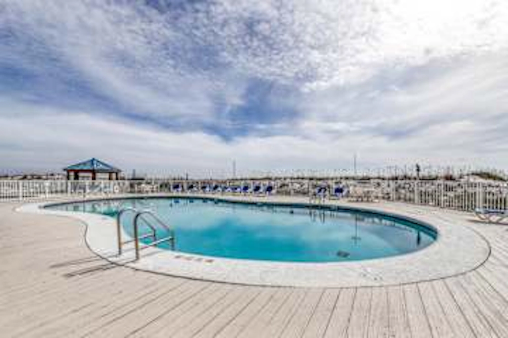 Adorable Studio on Beach with Shared Pool, Private Balcony, & Beach Access