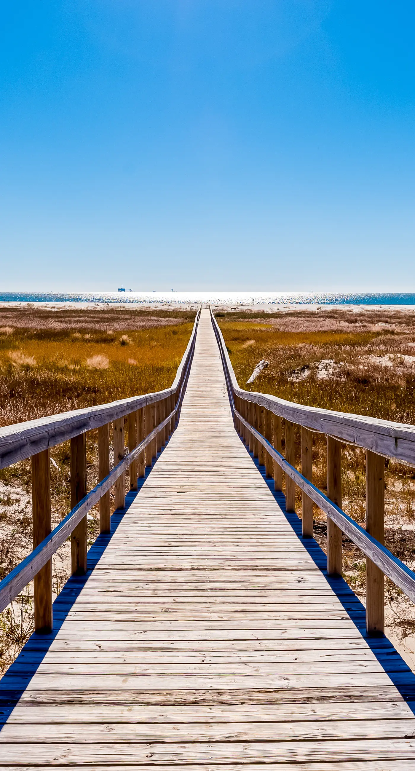 Ground-floor condo next to on-site pool with private patio & beach access