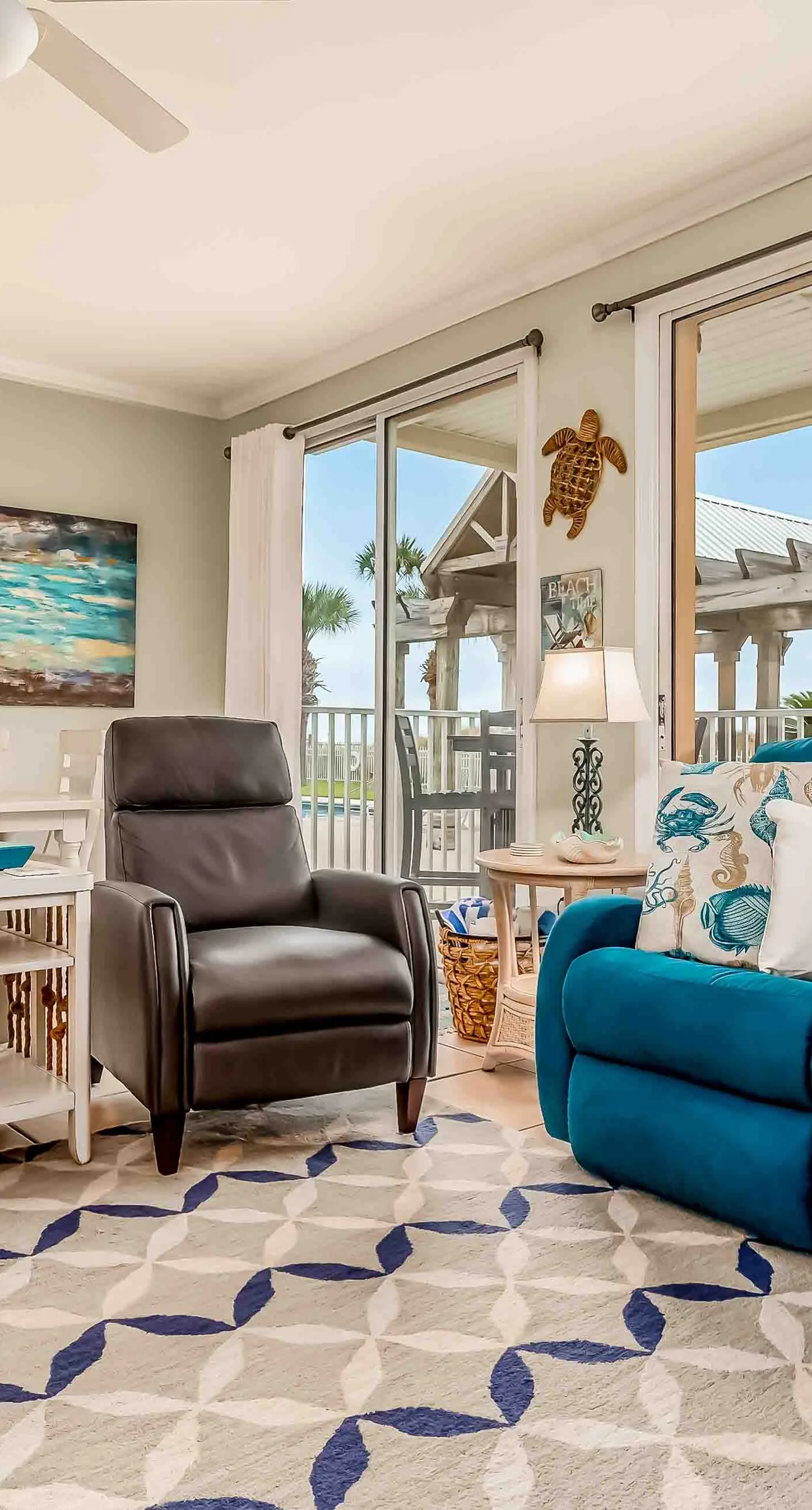 Ground-floor condo next to on-site pool with private patio & beach access