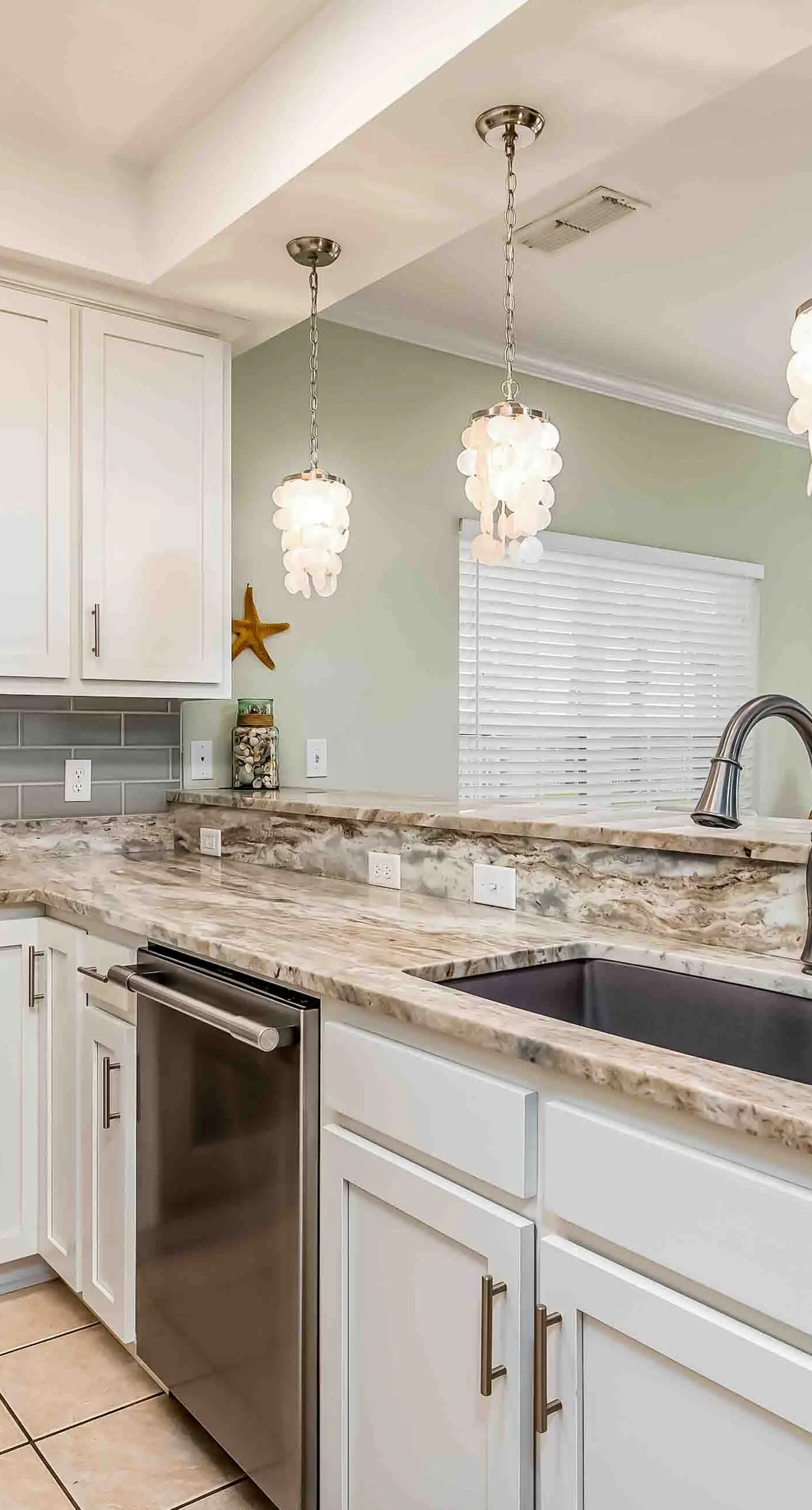 Ground-floor condo next to on-site pool with private patio & beach access