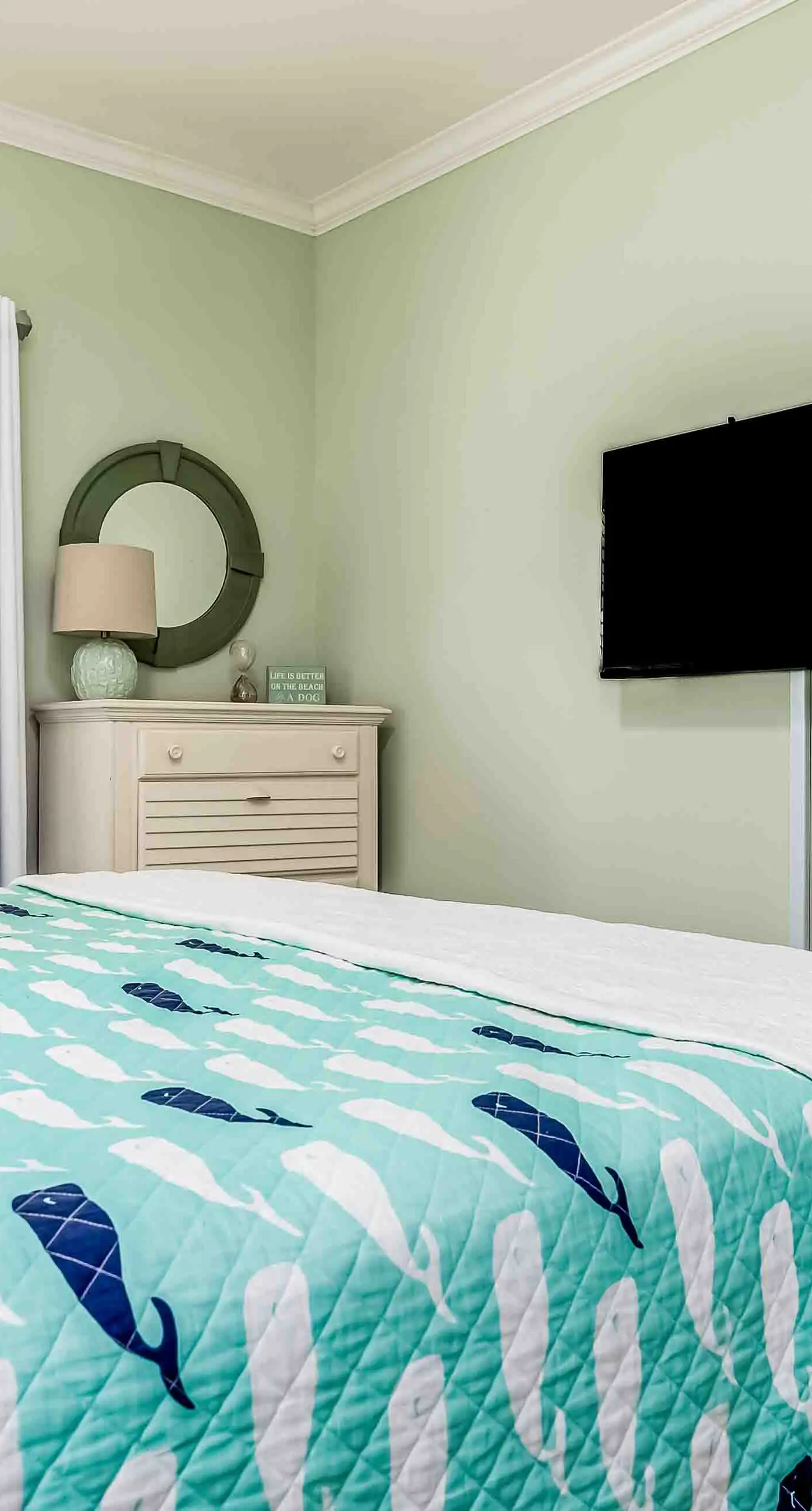 Ground-floor condo next to on-site pool with private patio & beach access