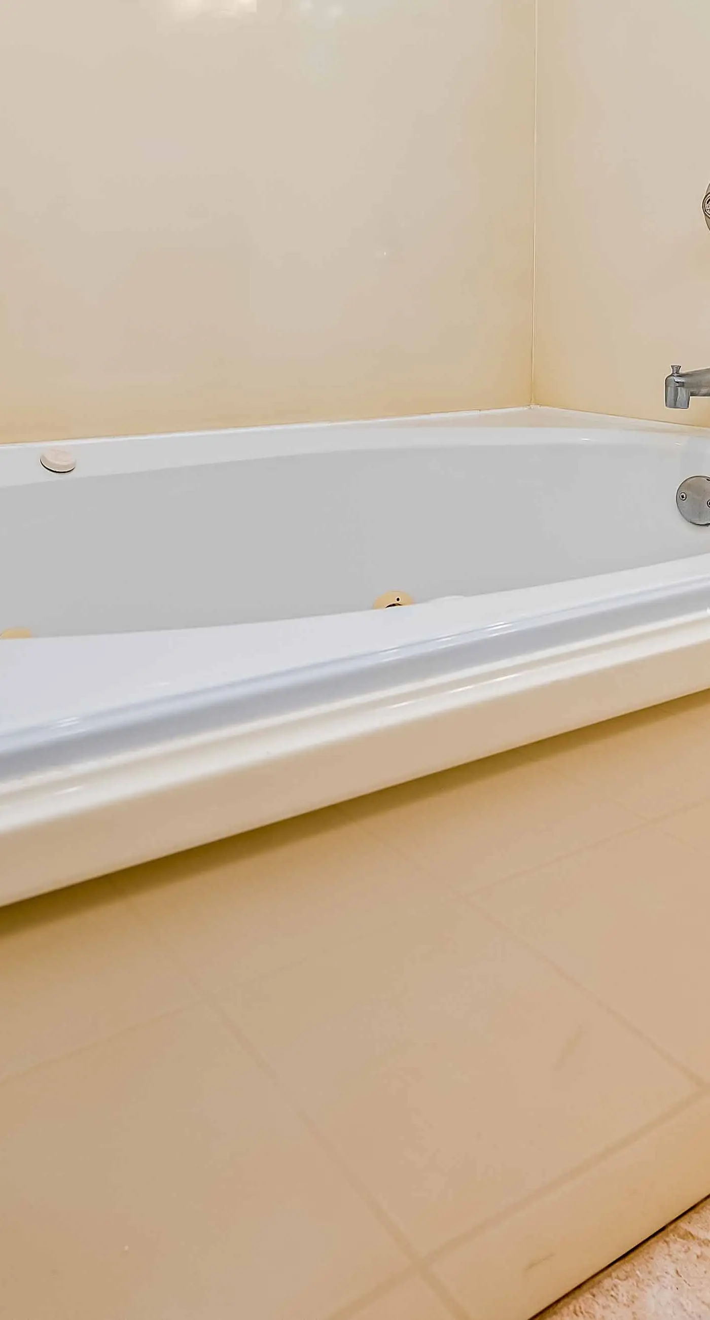 Ground-floor condo next to on-site pool with private patio & beach access