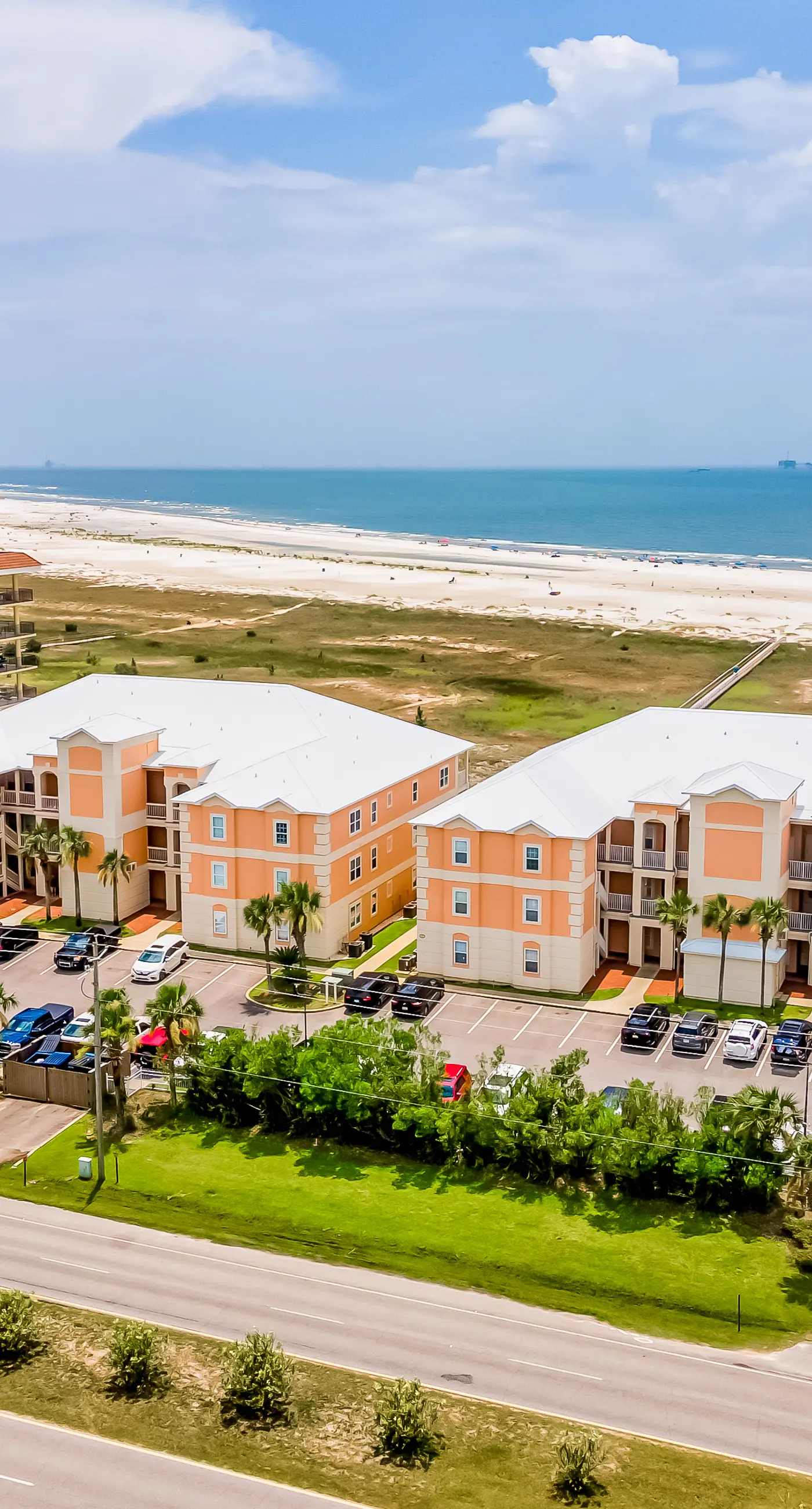 Ground-floor condo next to on-site pool with private patio & beach access