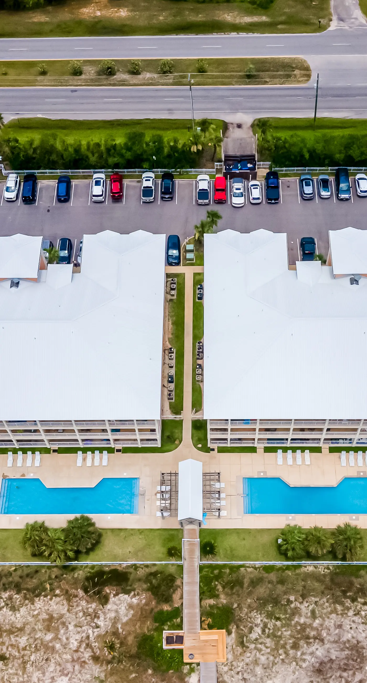 Ground-floor condo next to on-site pool with private patio & beach access