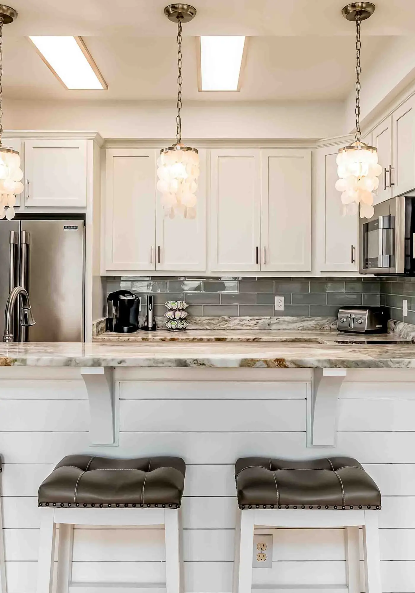 Ground-floor condo next to on-site pool with private patio & beach access