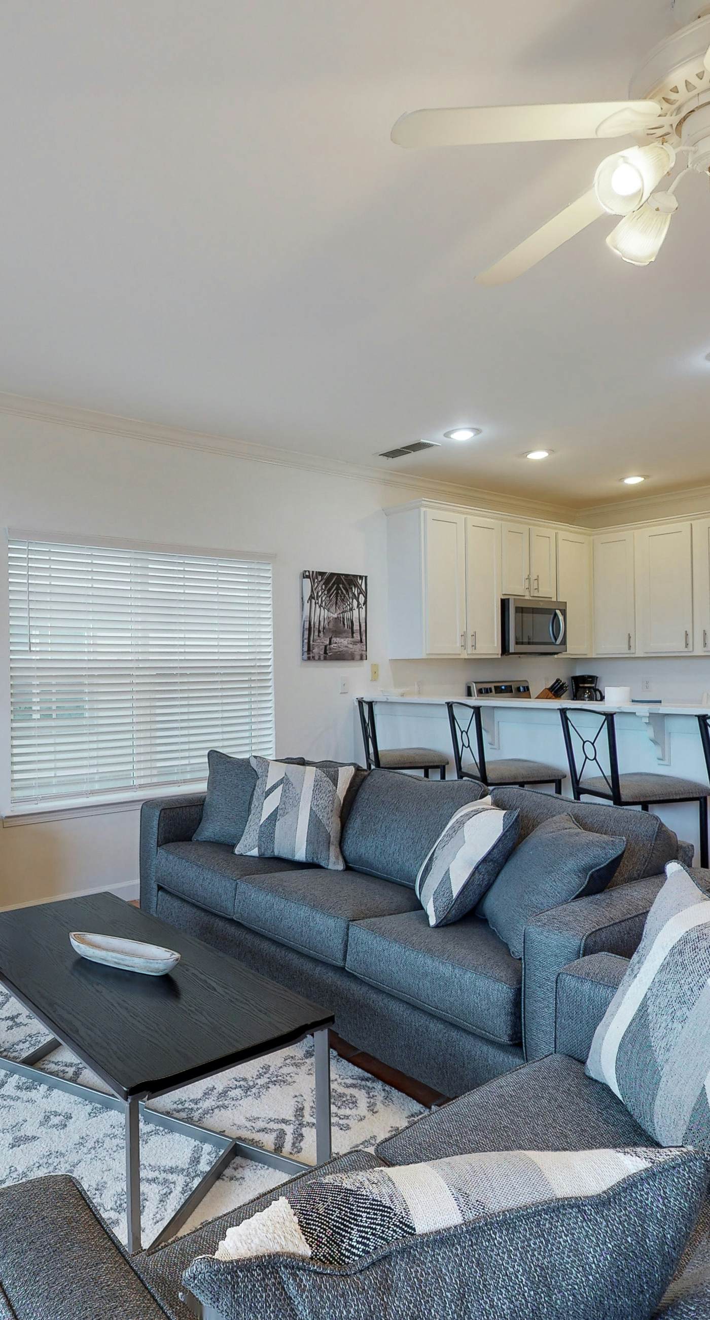 Newly -renovated waterfront condo w/two full kitchens, deck, WiFi, & shared pool