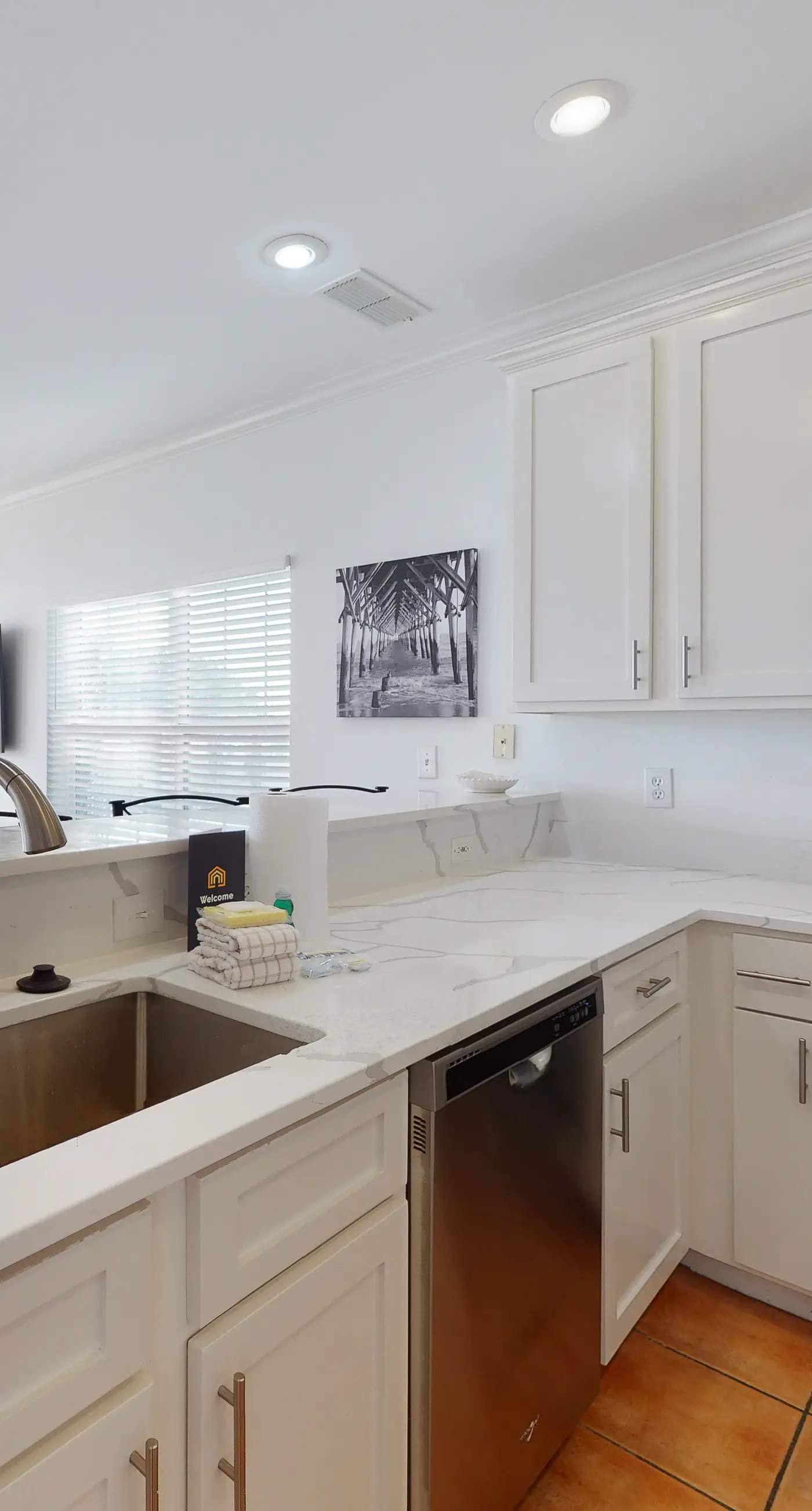 Newly -renovated waterfront condo w/two full kitchens, deck, WiFi, & shared pool