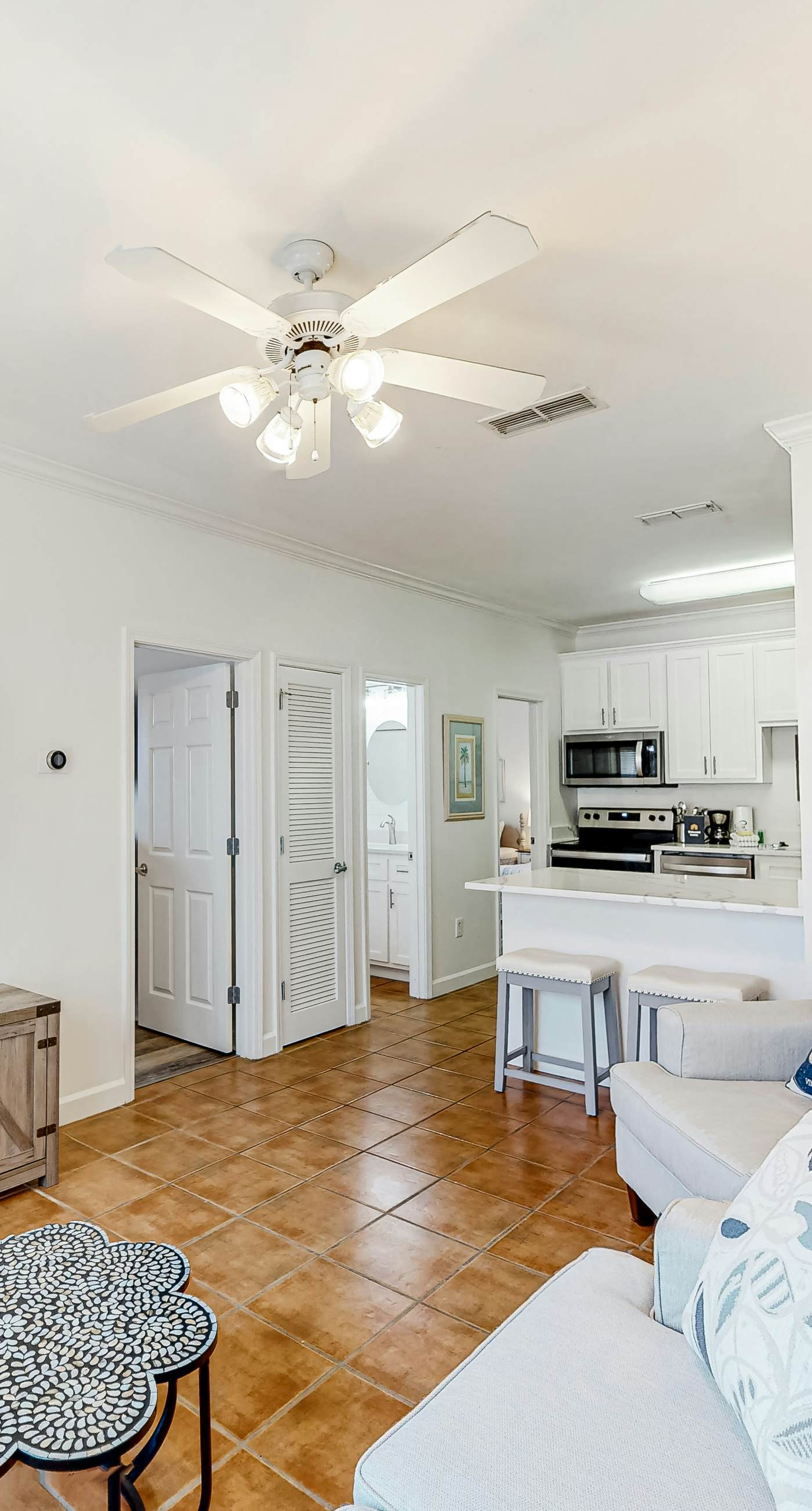 Newly renovated second-floor condo with shared pool, WiFi, W/D, & central AC