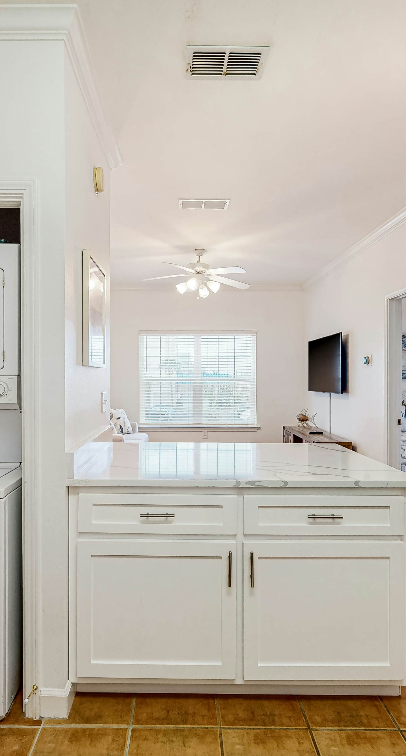 Newly renovated second-floor condo with shared pool, WiFi, W/D, & central AC