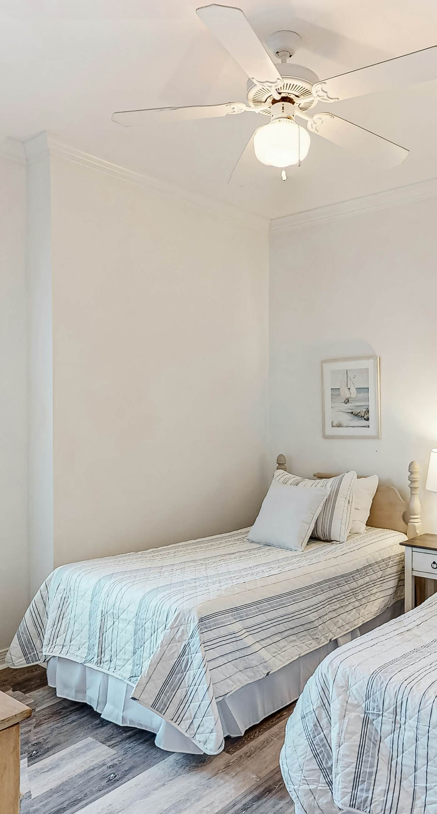 Newly renovated second-floor condo with shared pool, WiFi, W/D, & central AC