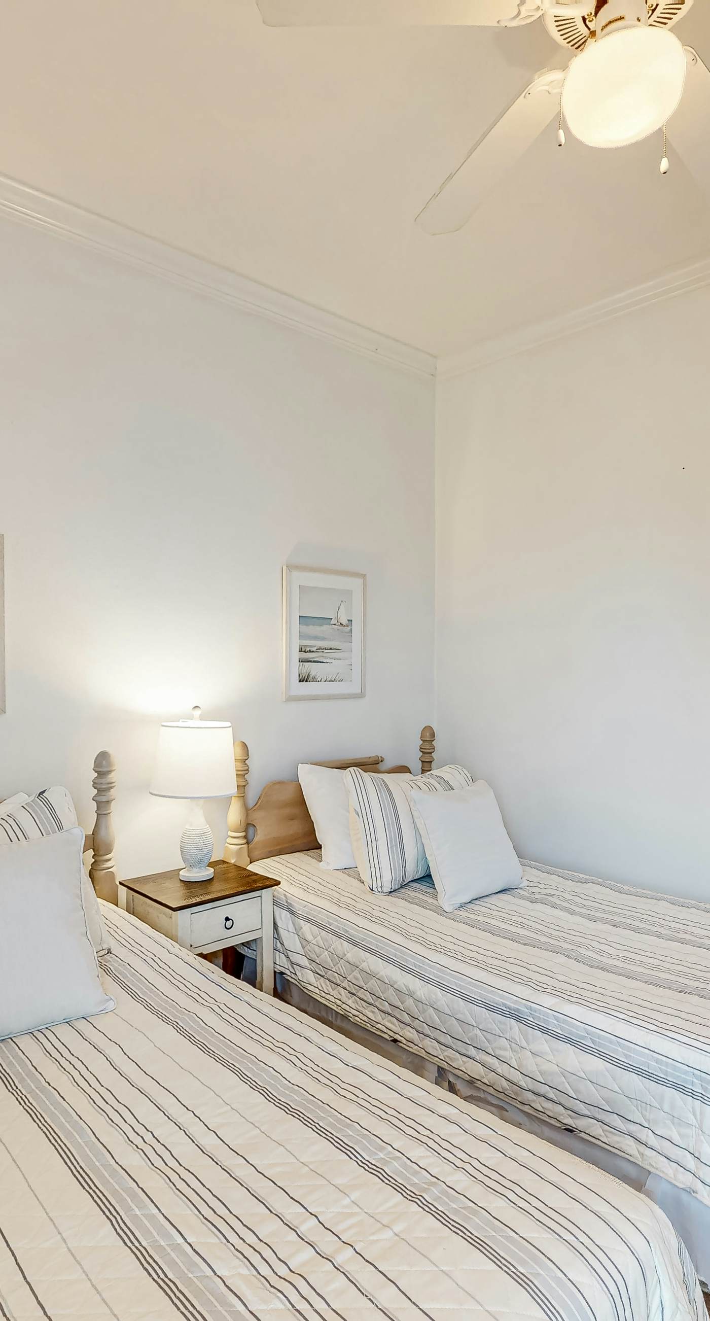 Newly renovated second-floor condo with shared pool, WiFi, W/D, & central AC