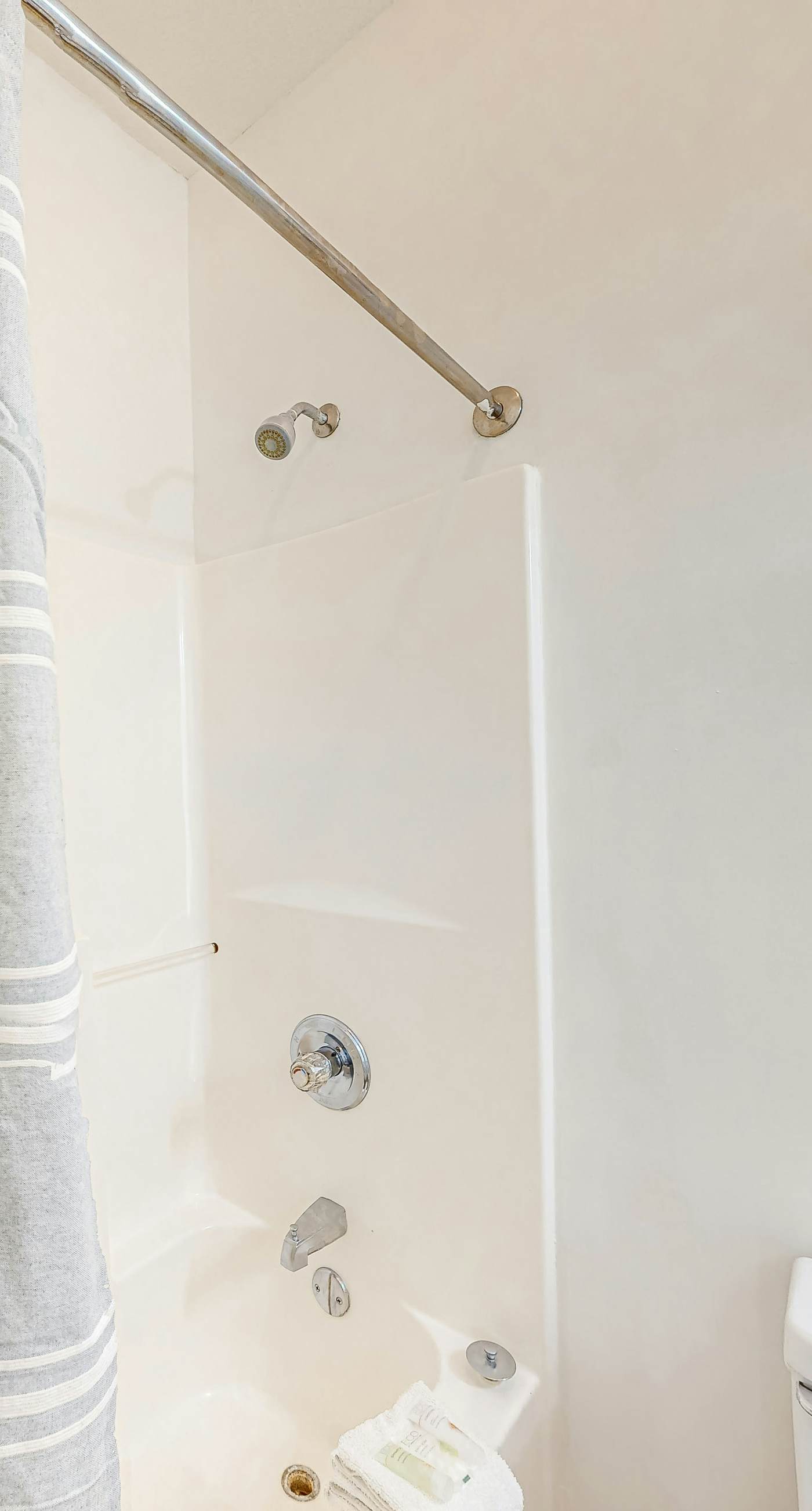 Newly renovated second-floor condo with shared pool, WiFi, W/D, & central AC