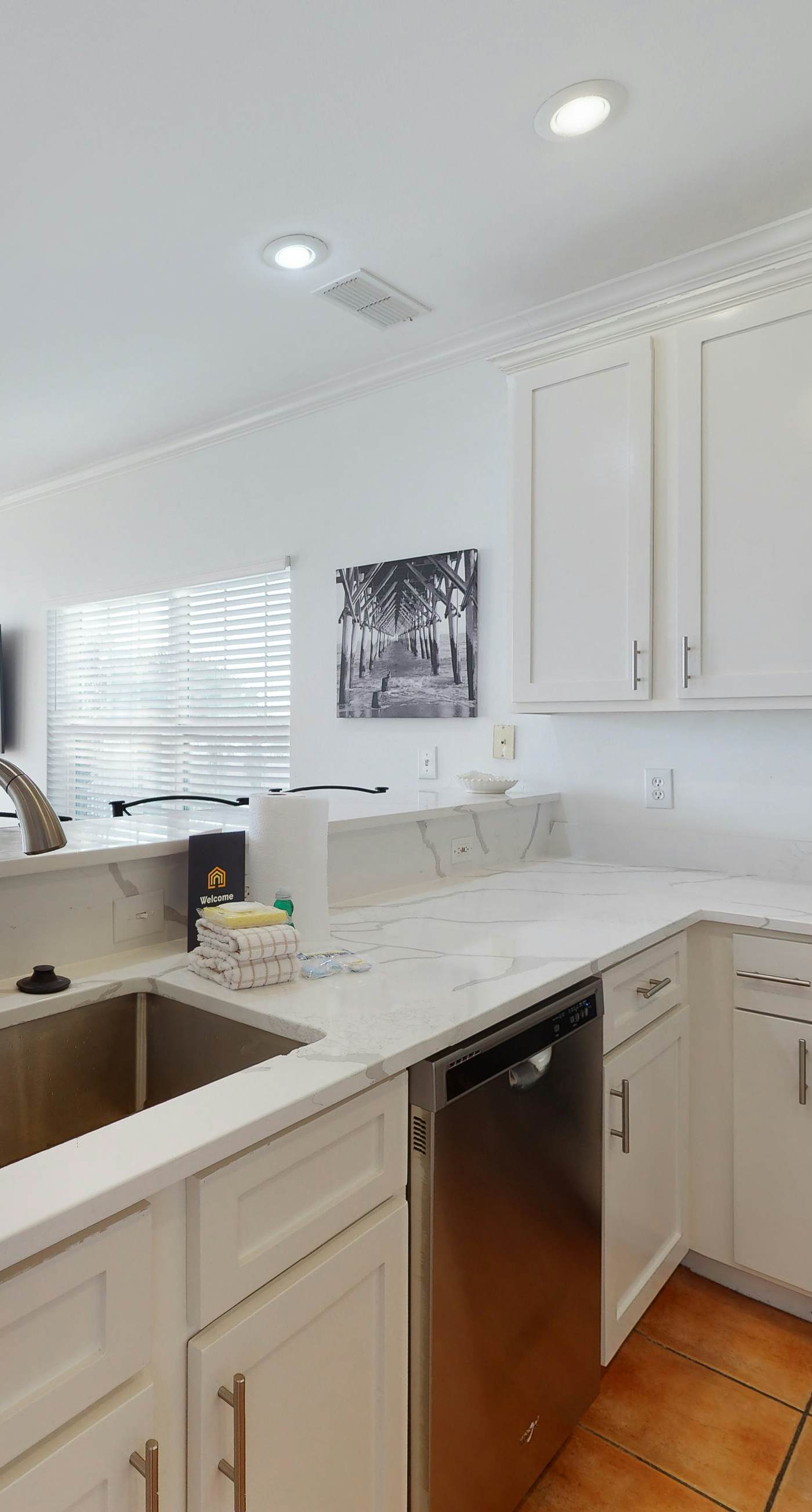 Newly renovated waterfront condo with pool, WiFi, W/D, & central AC