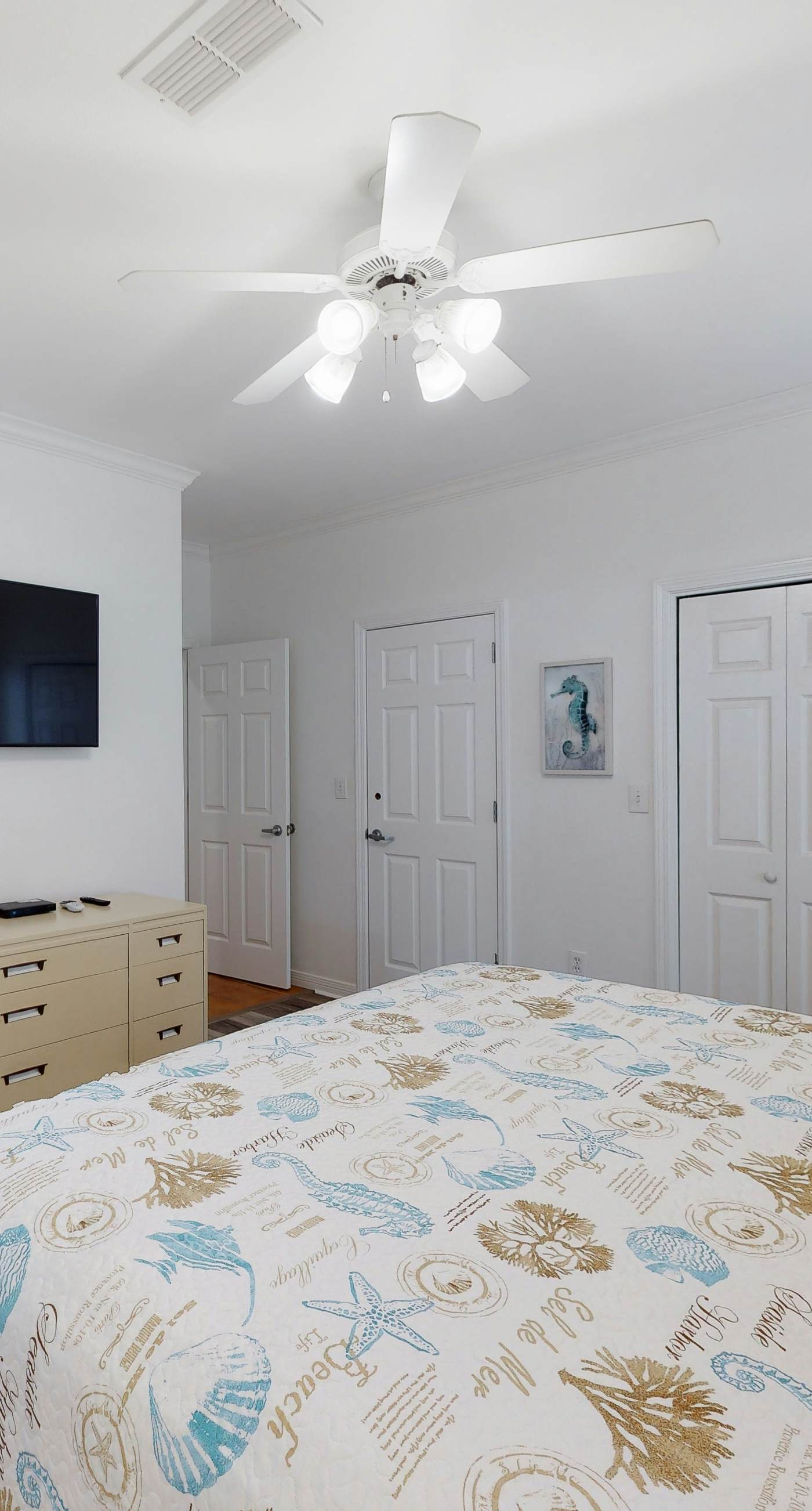 Newly renovated waterfront condo with pool, WiFi, W/D, & central AC