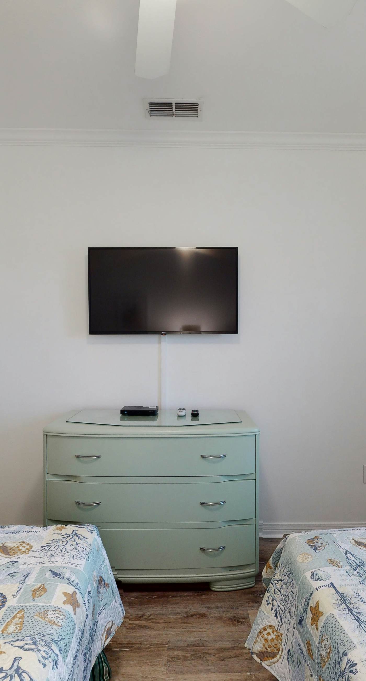 Newly renovated waterfront condo with pool, WiFi, W/D, & central AC