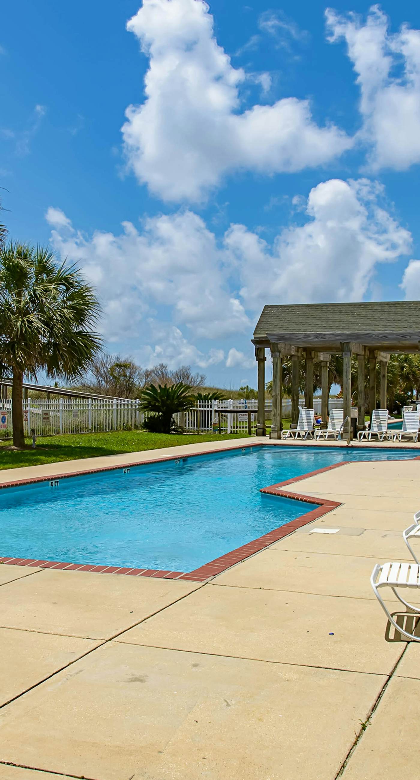 Newly renovated waterfront condo with pool, WiFi, W/D, & central AC