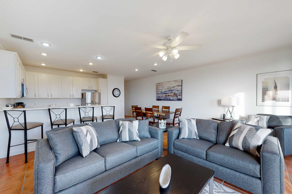 Newly renovated waterfront condo with pool, WiFi, W/D, & central AC