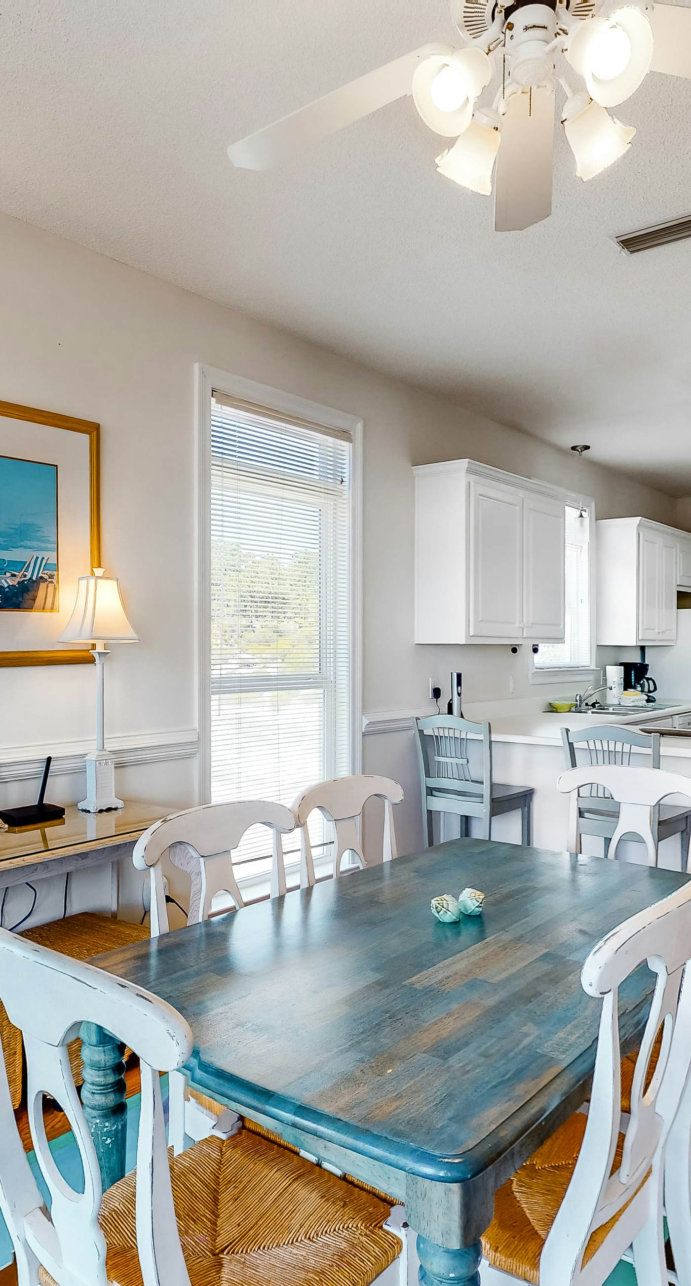 Bright duplex with two full kitchens, large decks, and private washer/dryers