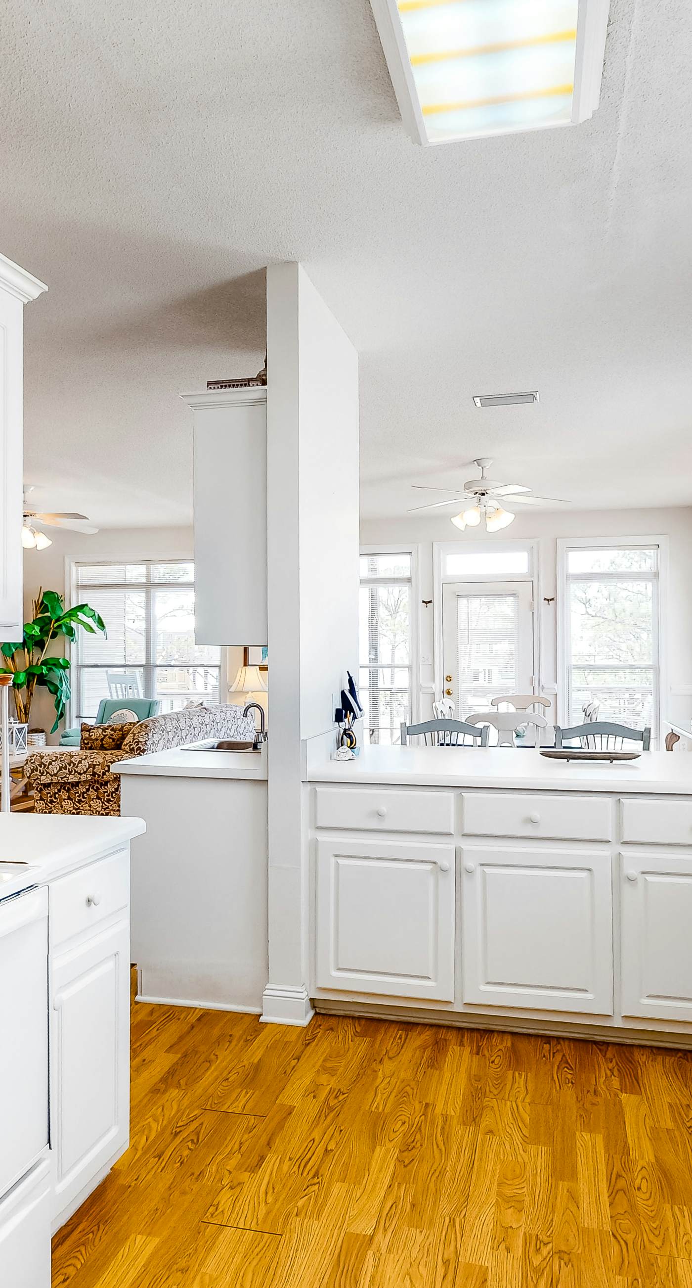 Bright duplex with two full kitchens, large decks, and private washer/dryers