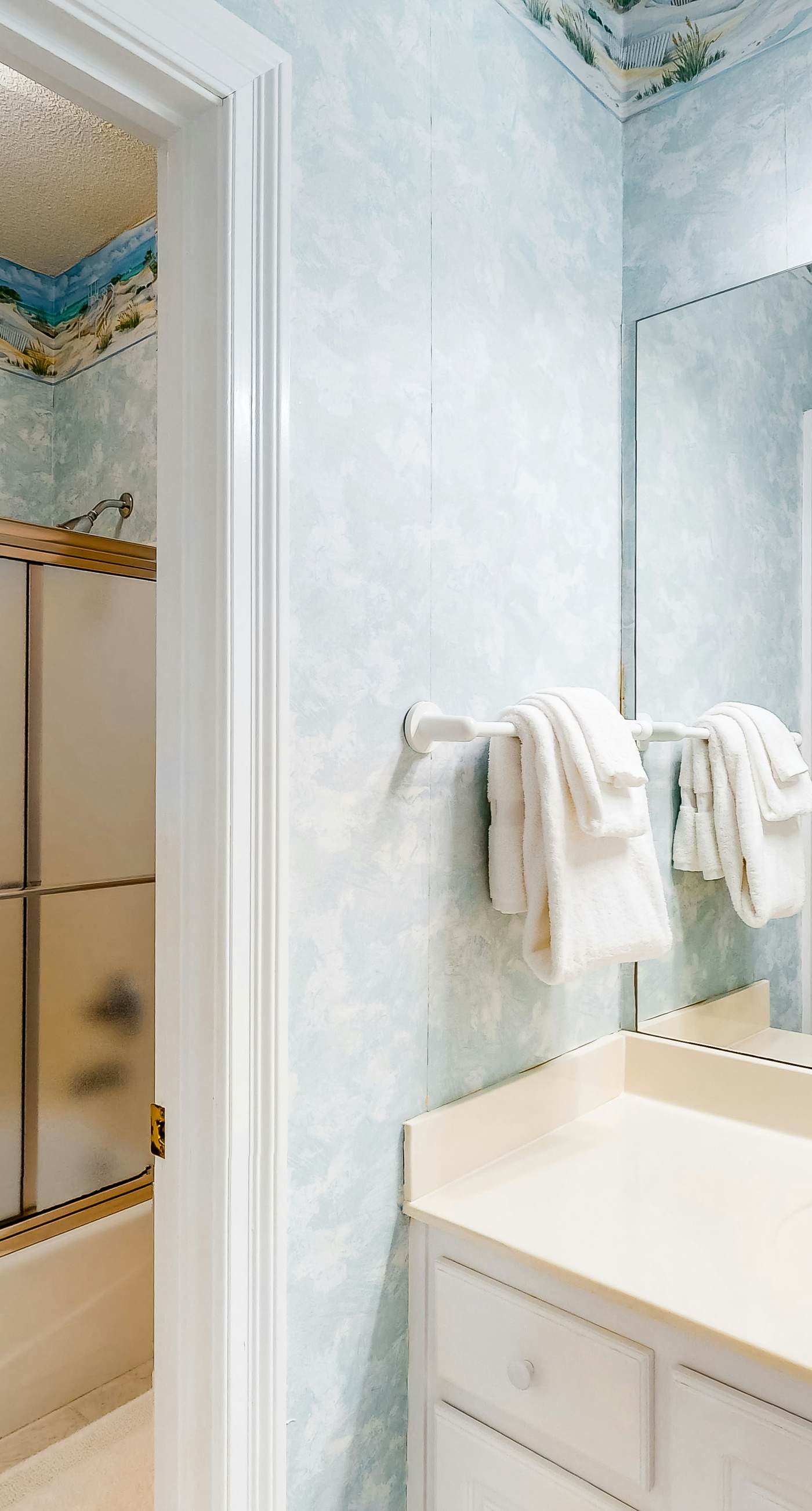 Bright duplex with two full kitchens, large decks, and private washer/dryers