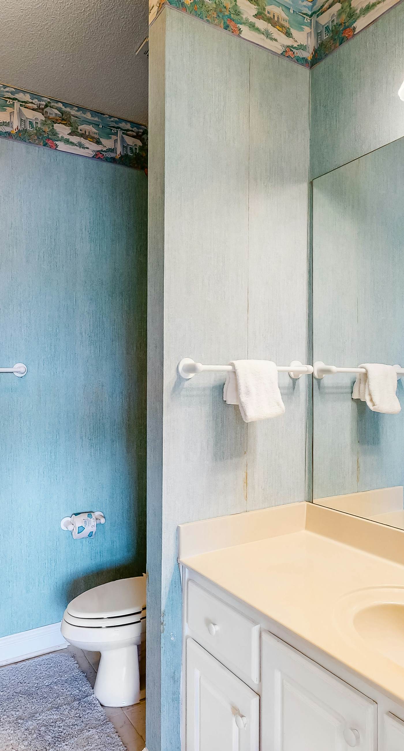 Bright duplex with two full kitchens, large decks, and private washer/dryers