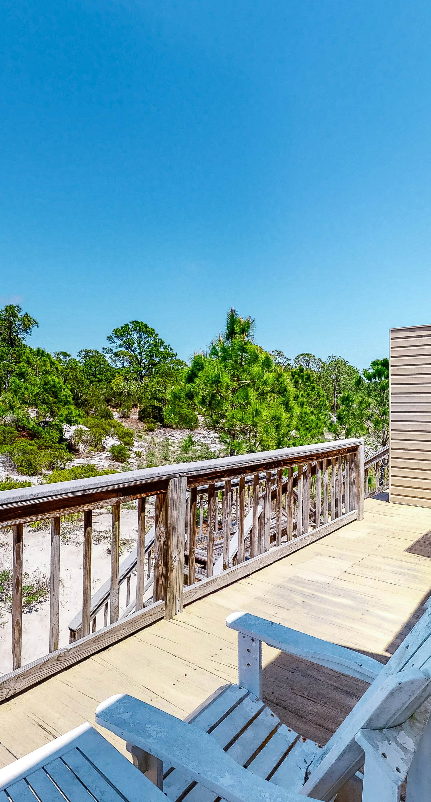 Bright duplex with two full kitchens, large decks, and private washer/dryers