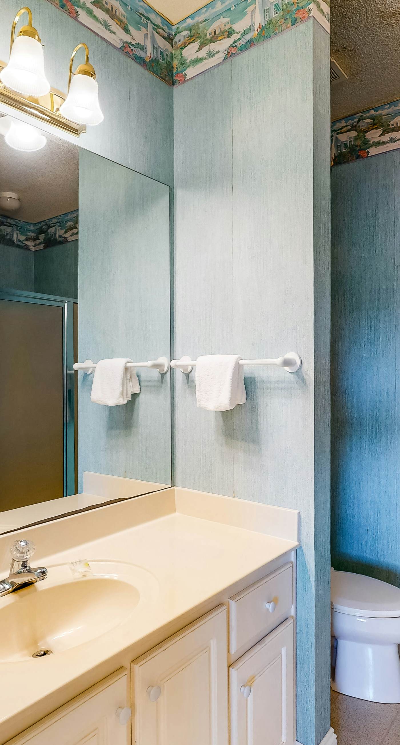 Bright duplex with two full kitchens, large decks, and private washer/dryers