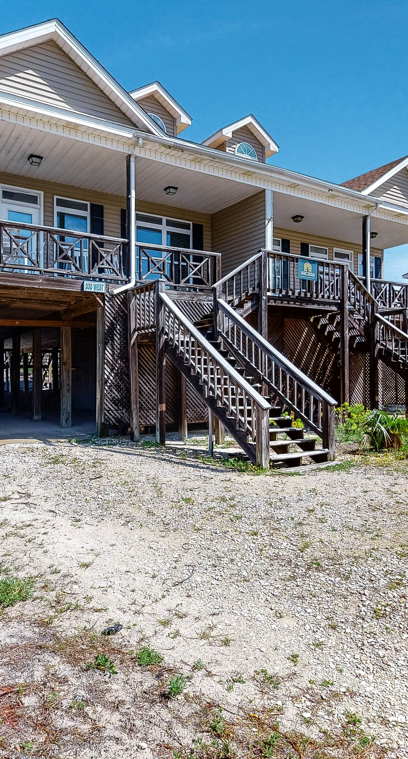 Bright duplex with two full kitchens, large decks, and private washer/dryers