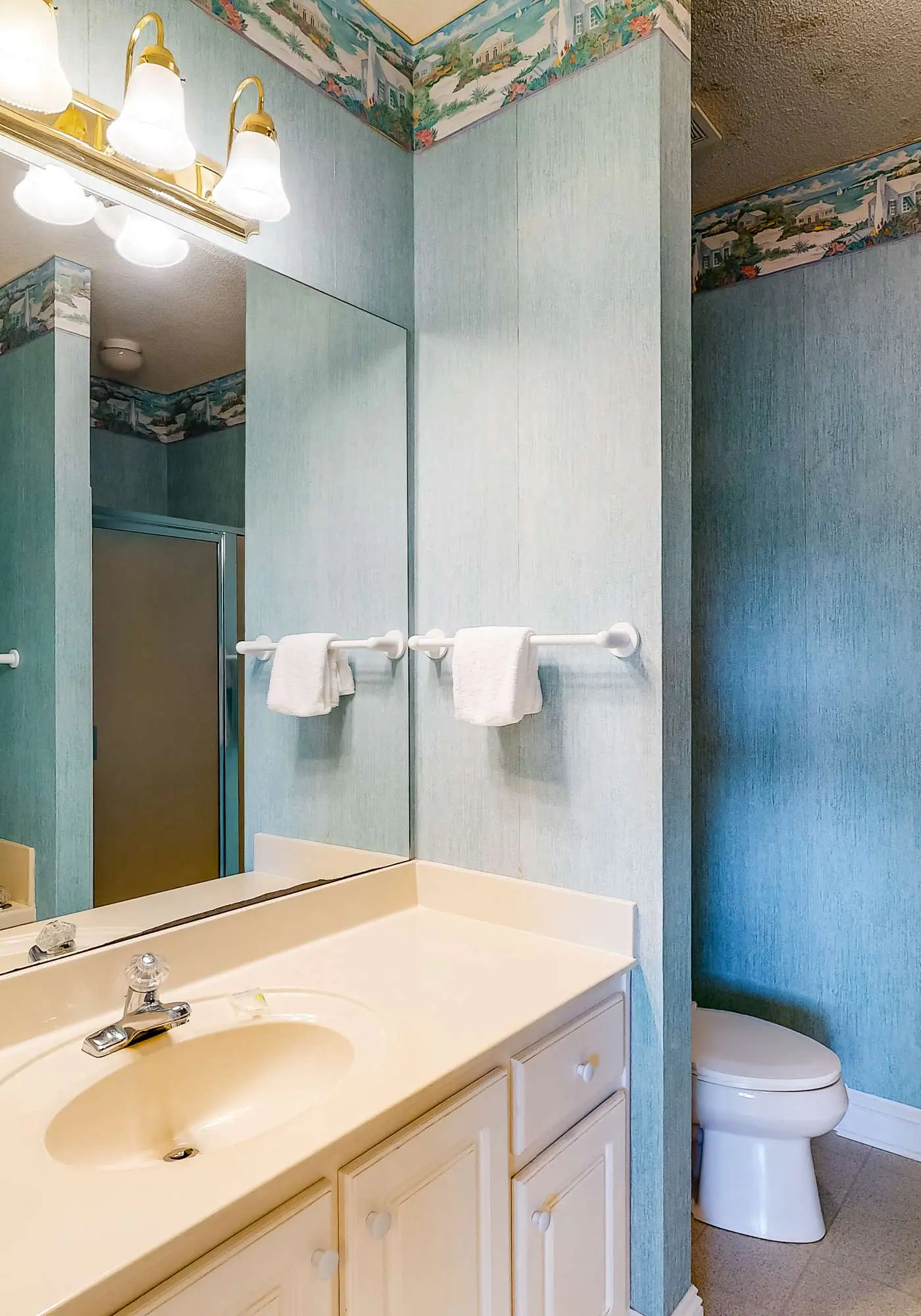 Bright duplex with two full kitchens, large decks, and private washer/dryers