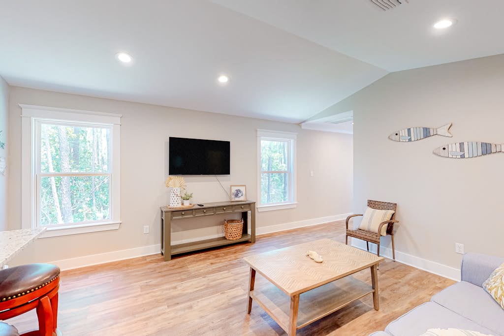 Stylish island condo near the beach with fast WiFi, central AC, & private W/D