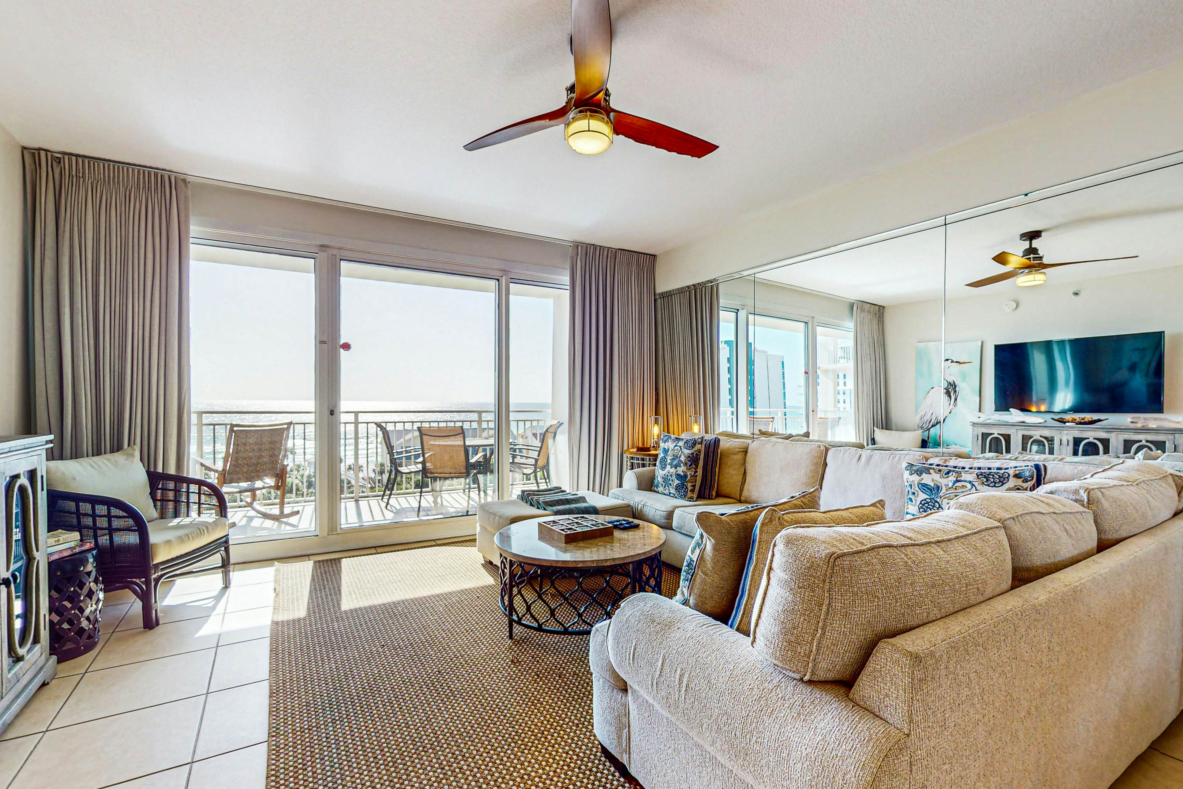 7th floor condo with ocean views, shared pool, central AC, and washer/dryer