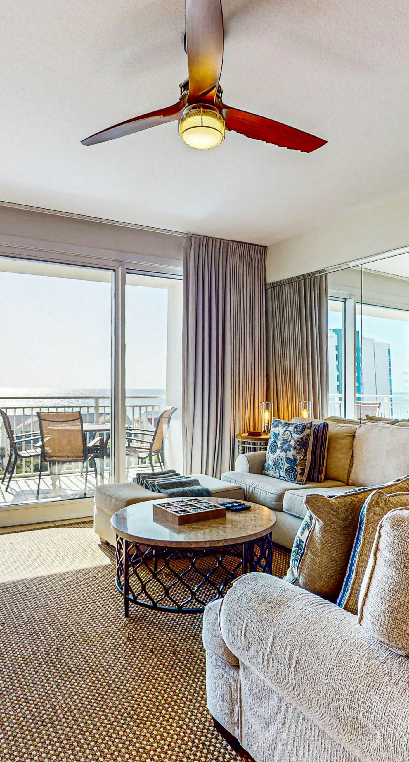 7th floor condo with ocean views, shared pool, central AC, and washer/dryer