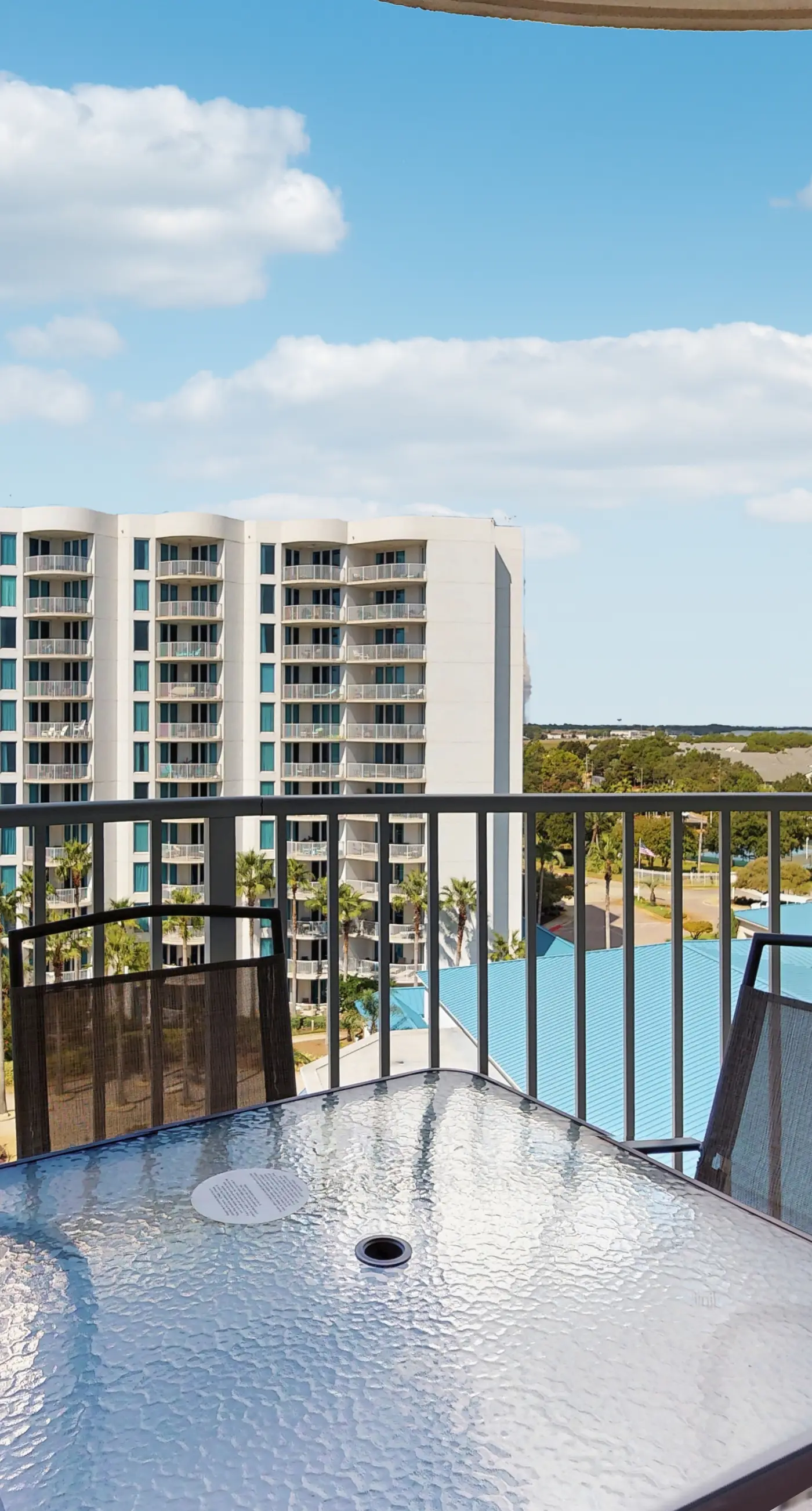 Sunlit Condo with Shared Pools, Partial Ocean Views, Fast WiFi, & Private W/D