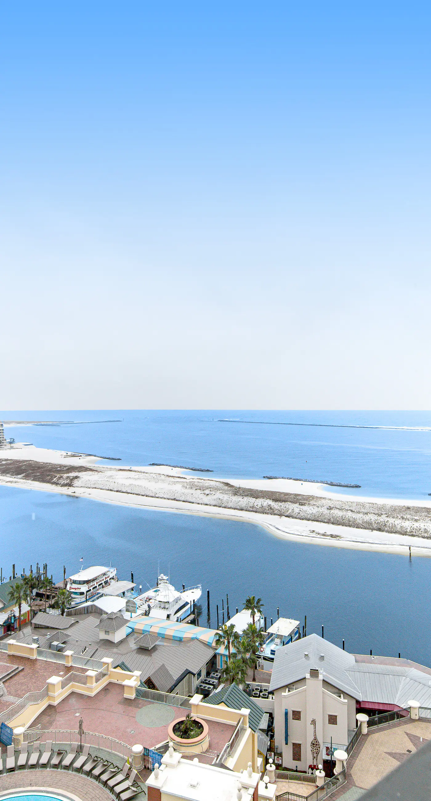 Gulf-view condo with balcony, W/D, AC, pools, hot tubs & gym