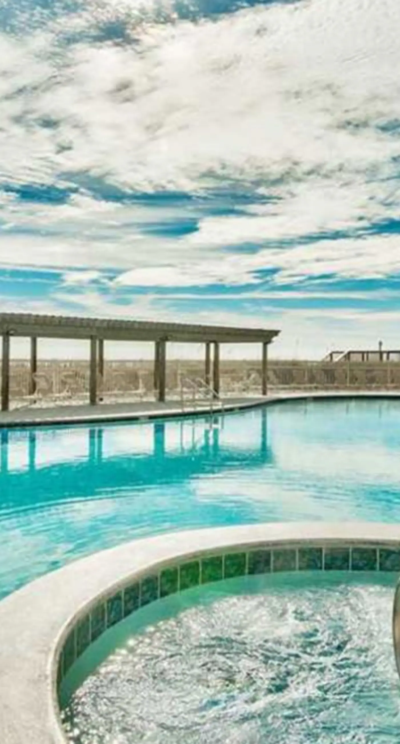 Fourth Floor Oceanfront Condo with Shared Pool, Ocean View, WiFi, W/D, and AC