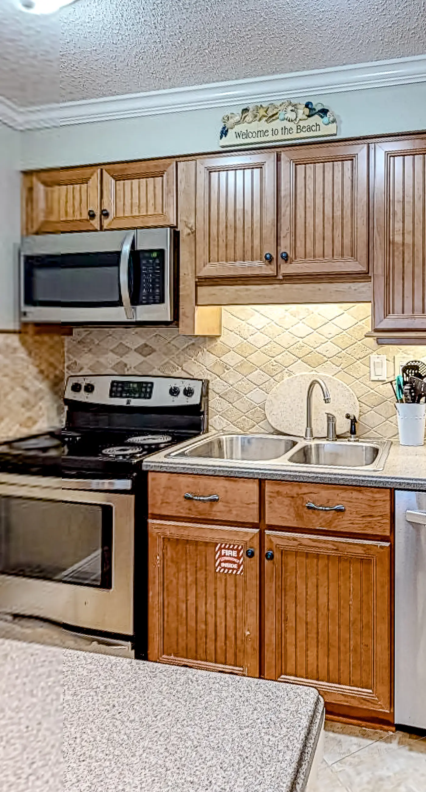 Fourth Floor Oceanfront Condo with Shared Pool, Ocean View, WiFi, W/D, and AC