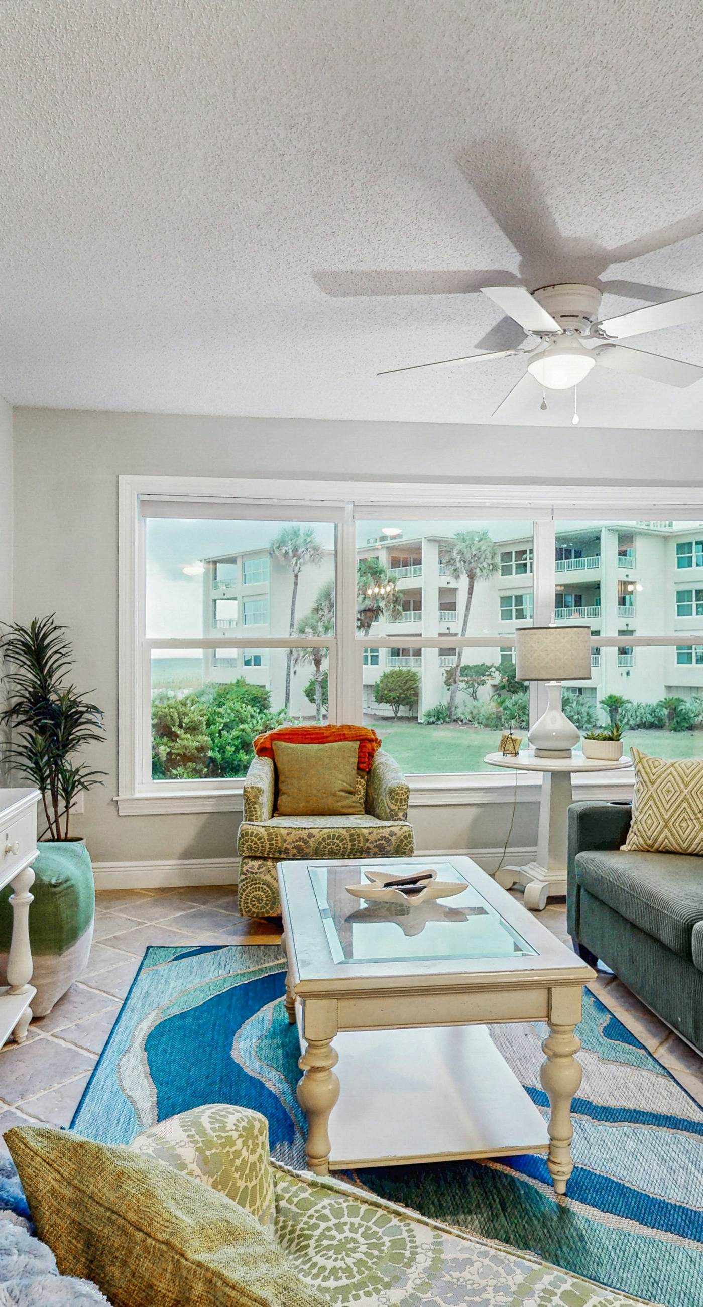 Gulf-view condo with balcony, outdoor pool, gym, tennis, AC - snowbird-friendly