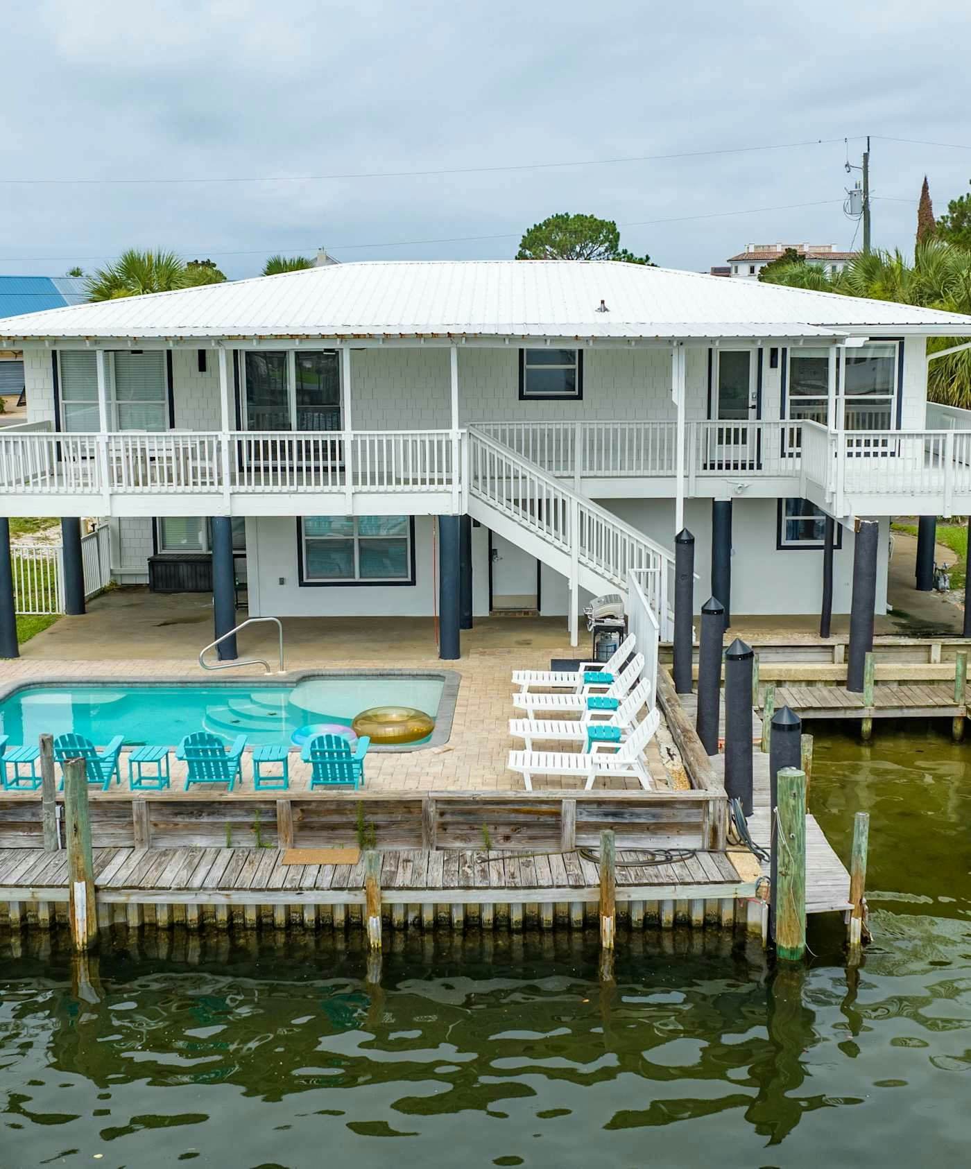 Canal-front home with pool, 40' boat slip, gated beach access - 1 block to sand