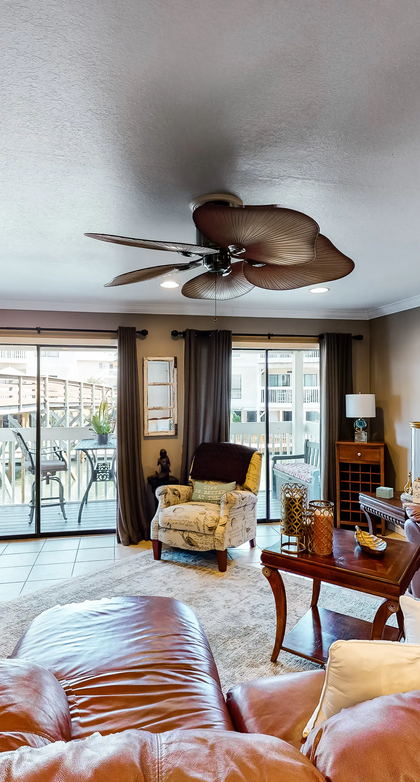 Cozy coastal condo with pool, easy beach access, balcony & canal views