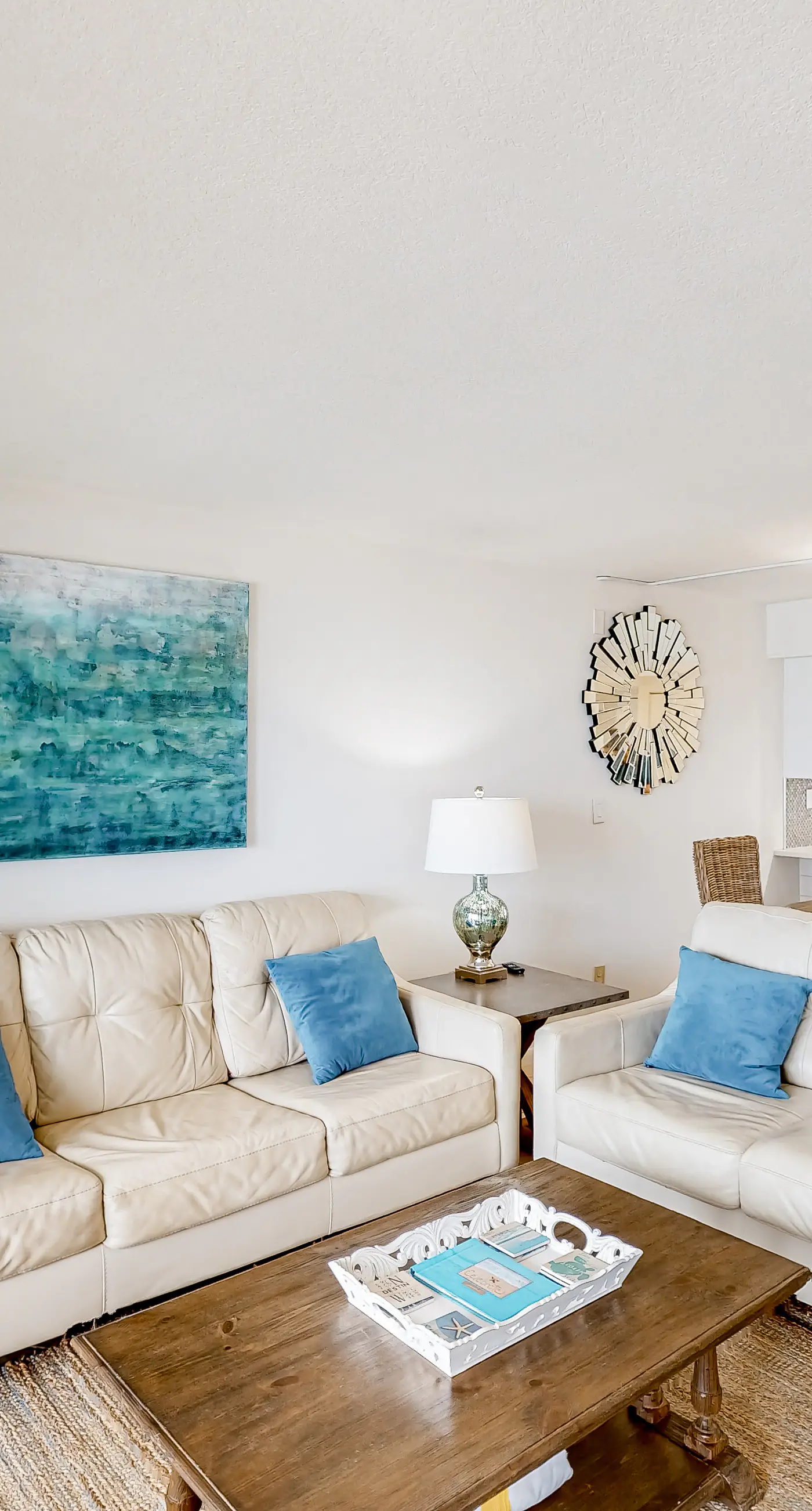 Waterfront escape with gulf views, pool, beach access, gym, balcony & AC