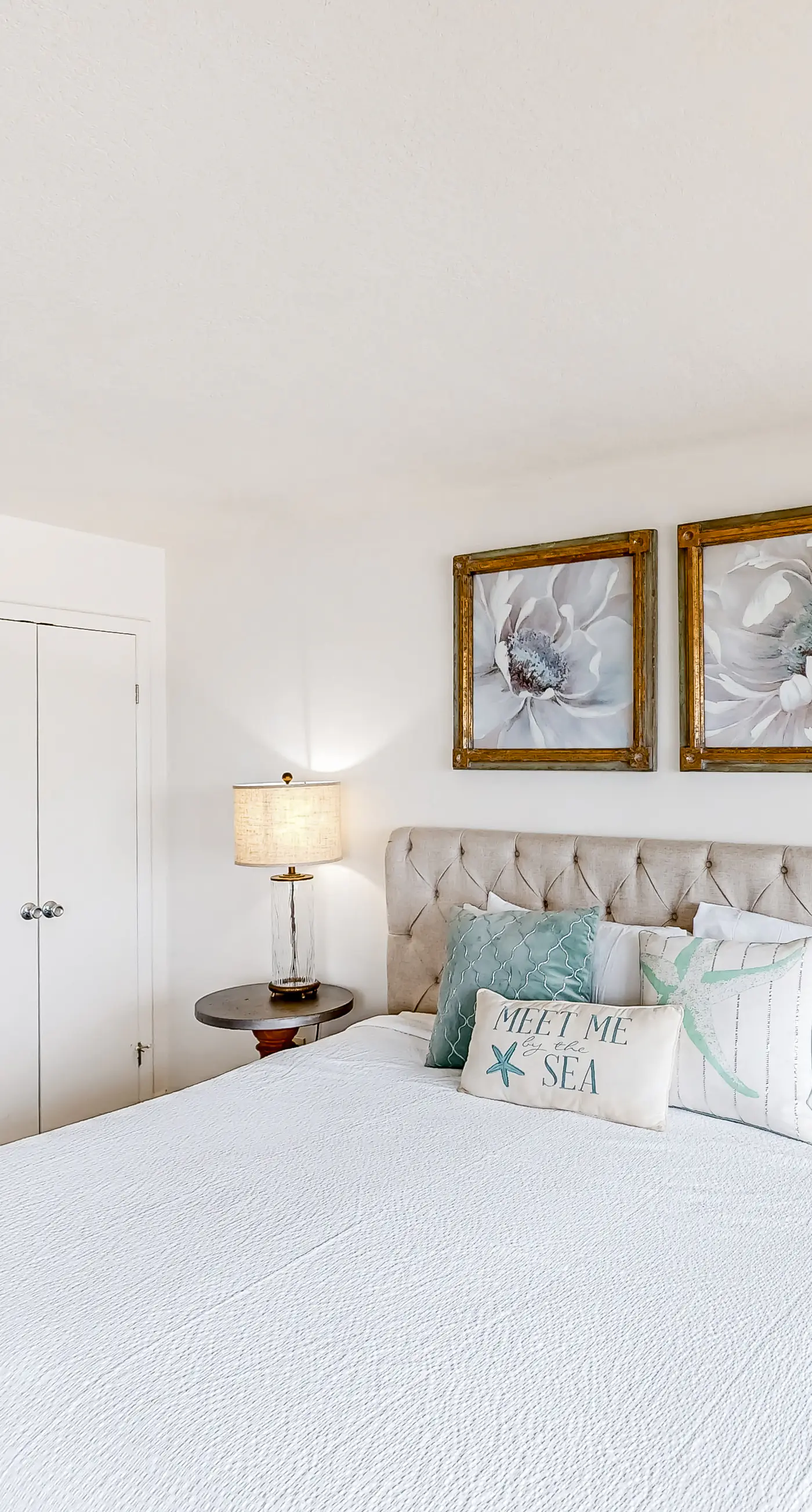 Waterfront escape with gulf views, pool, beach access, gym, balcony & AC