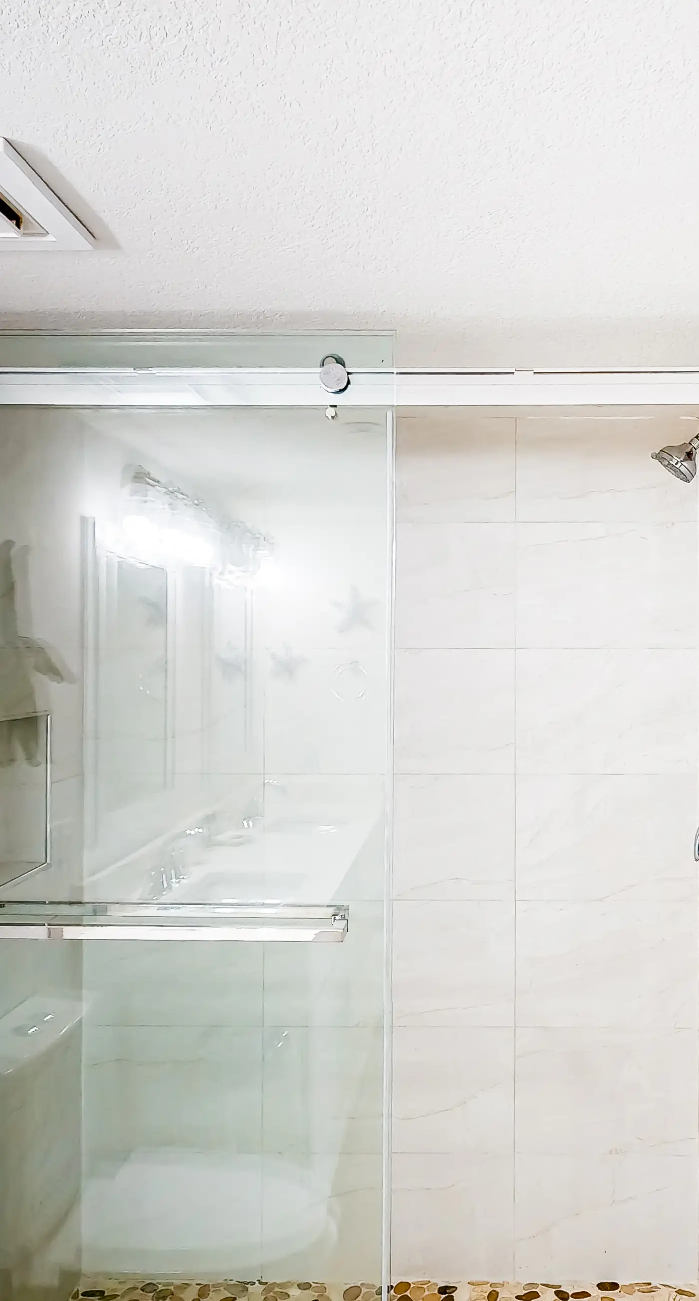 Waterfront escape with gulf views, pool, beach access, gym, balcony & AC