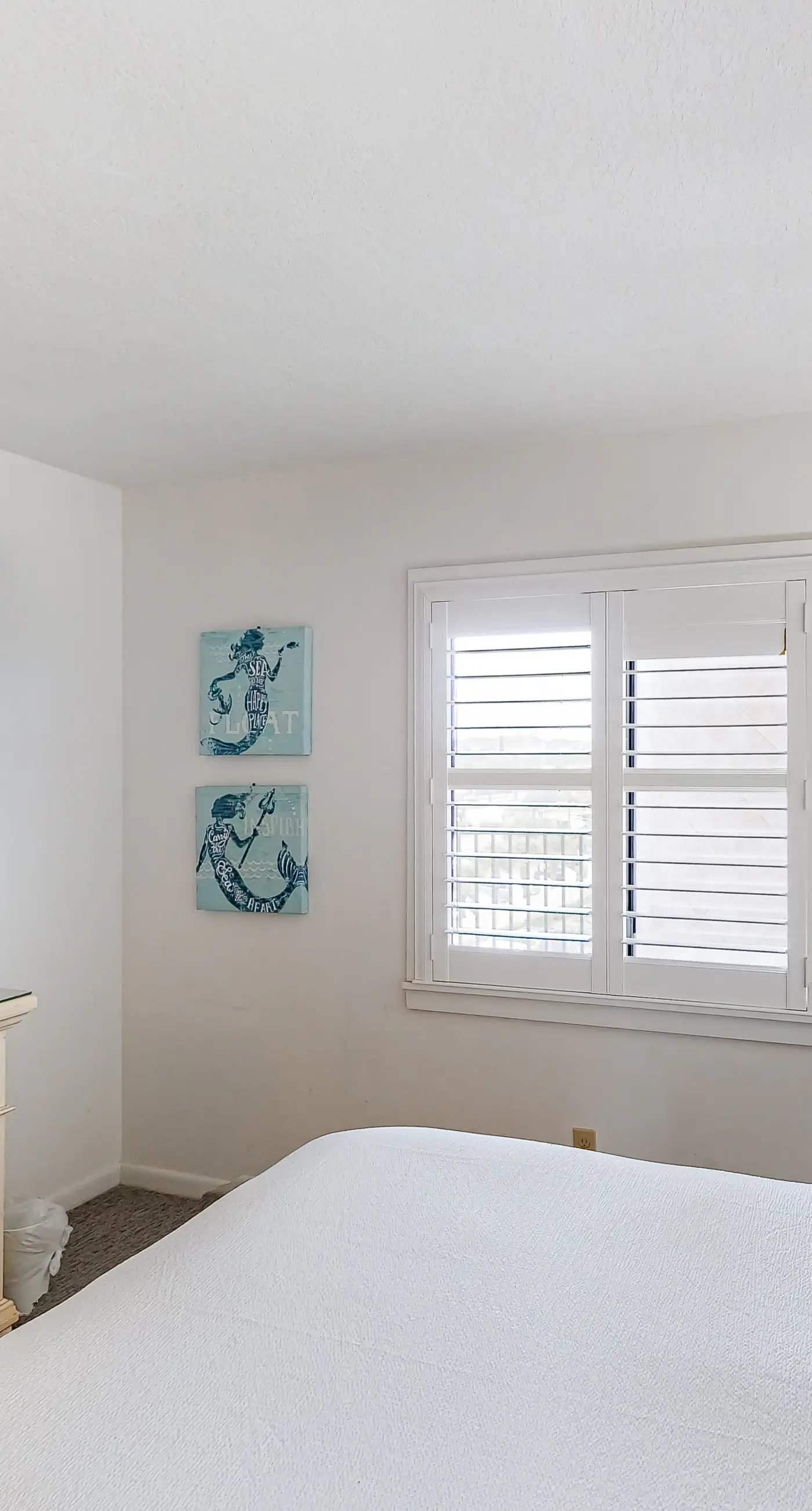 Waterfront escape with gulf views, pool, beach access, gym, balcony & AC