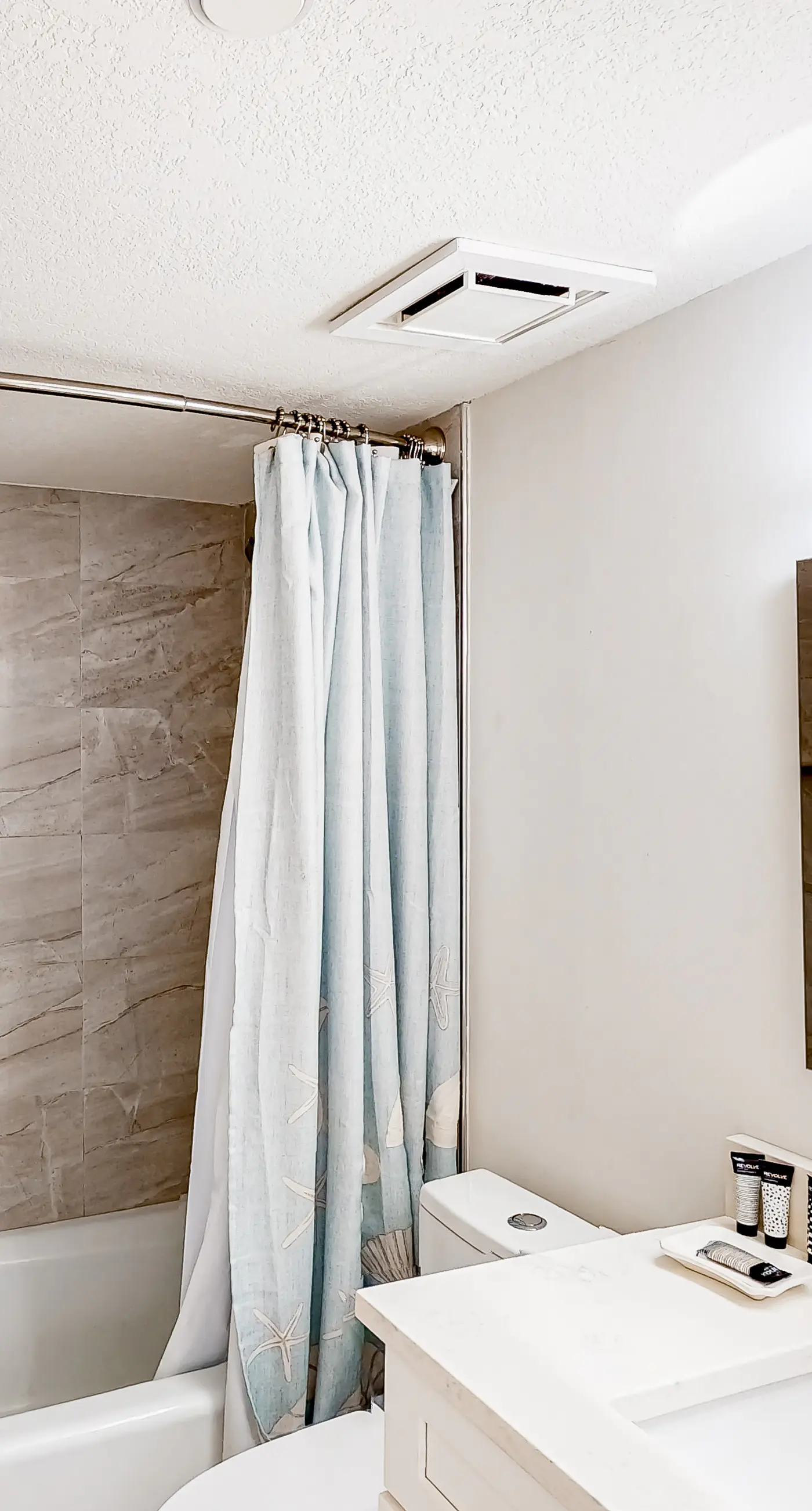 Waterfront escape with gulf views, pool, beach access, gym, balcony & AC