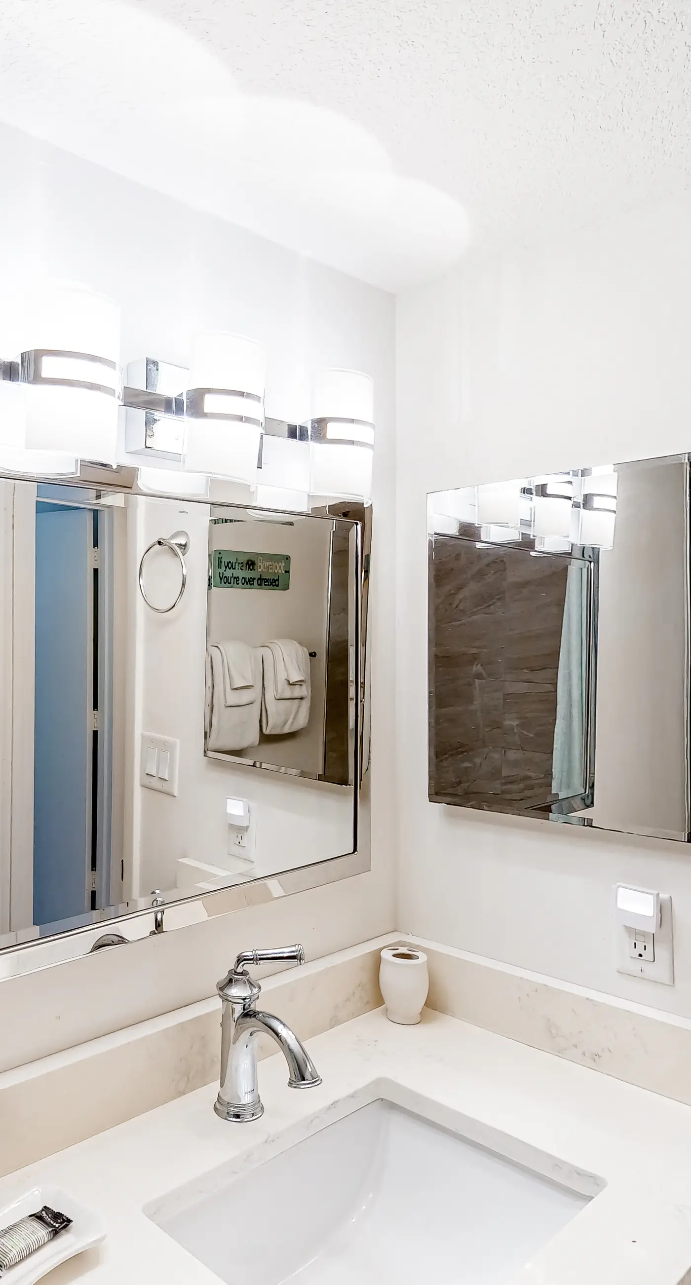 Waterfront escape with gulf views, pool, beach access, gym, balcony & AC