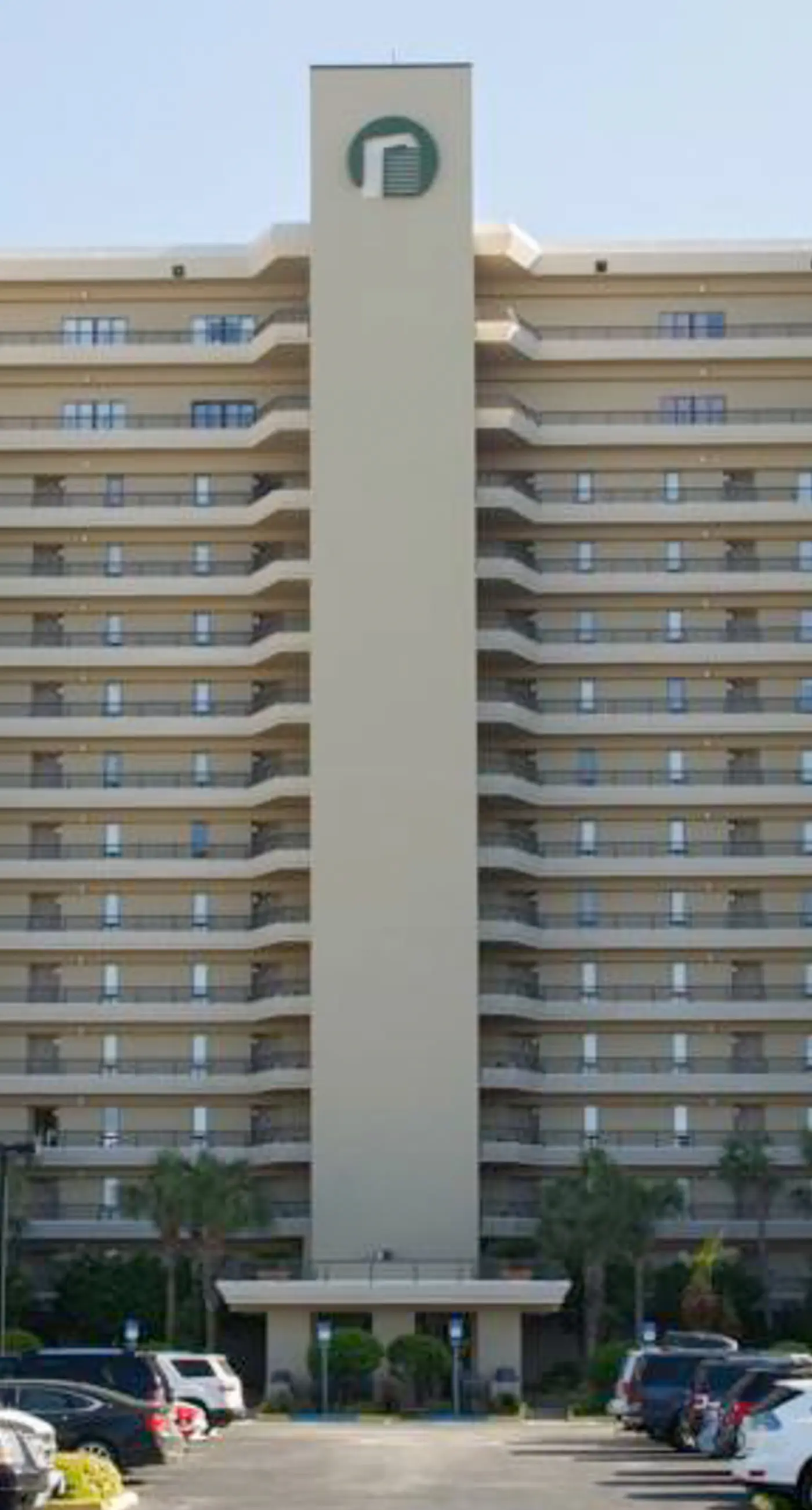 Waterfront escape with gulf views, pool, beach access, gym, balcony & AC