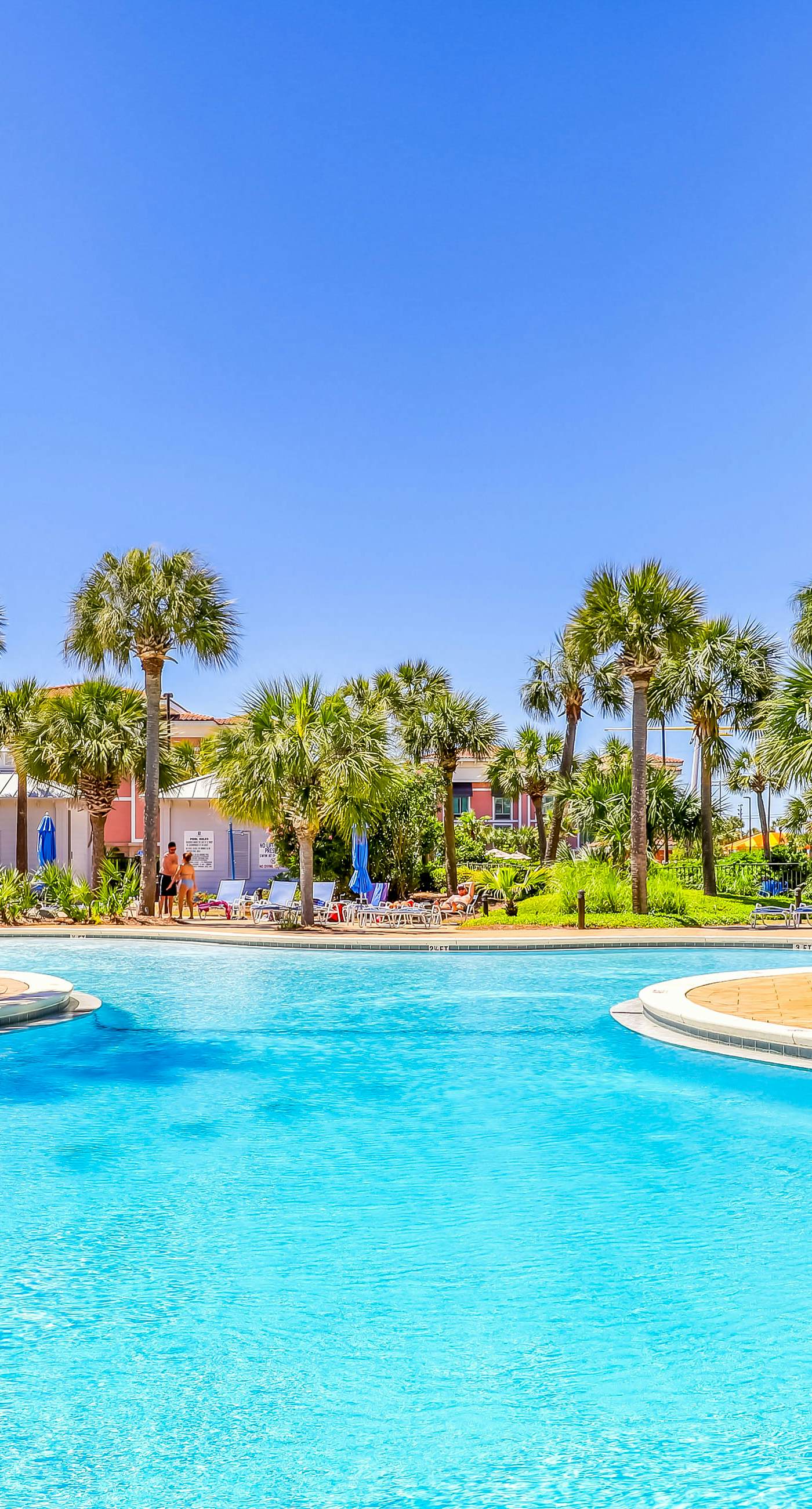 Gorgeous 2nd-floor condo with W/D, resort-style pool, gym, and beach access