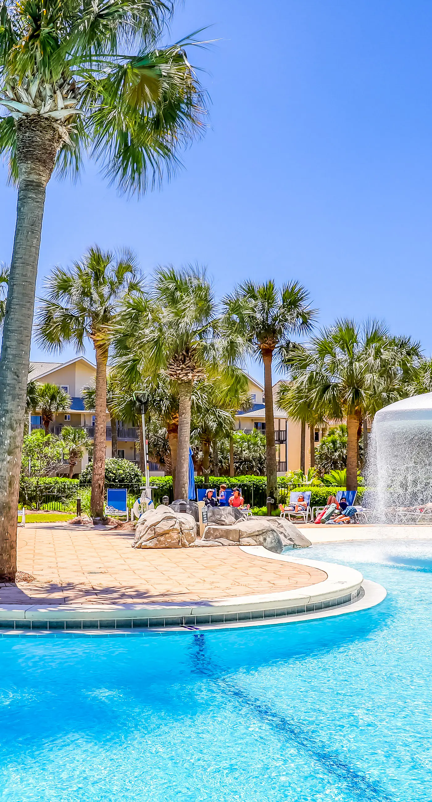 Gorgeous 2nd-floor condo with W/D, resort-style pool, gym, and beach access