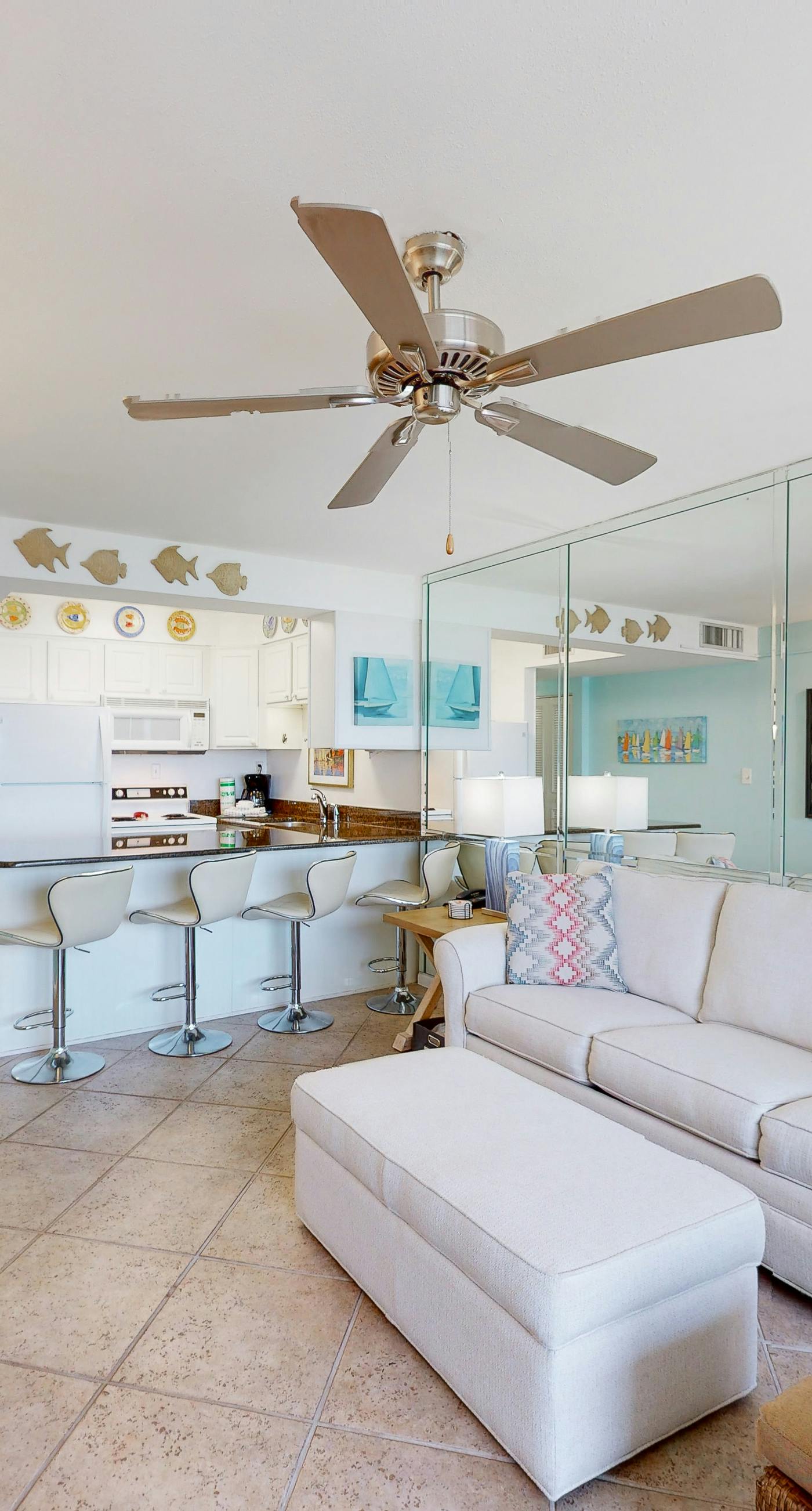 Fifth-floor, Gulf view condo with a washer/dryer, pool, tennis, & fitness room